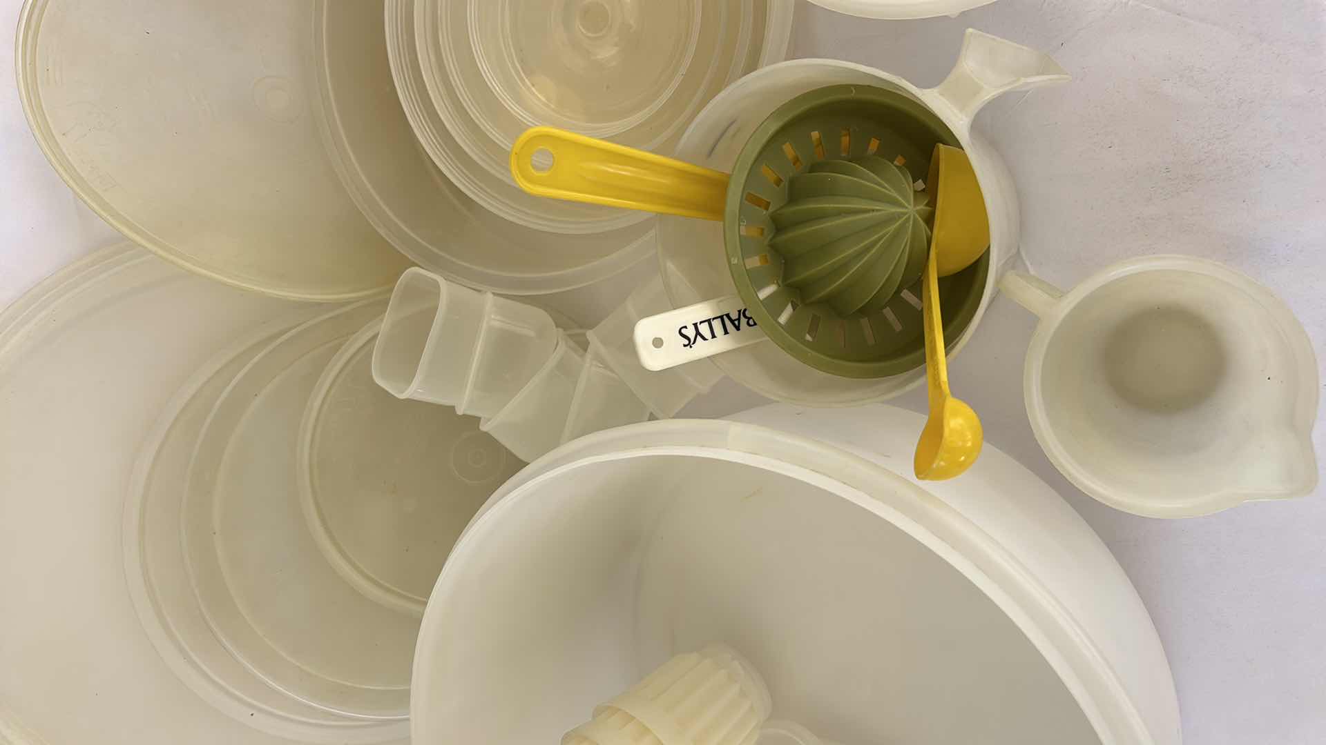 Photo 1 of VINTAGE TUPPERWARE PLASTIC STORAGE CONTAINERS, LIDS, BOWLS & MEASURING TOOLS
