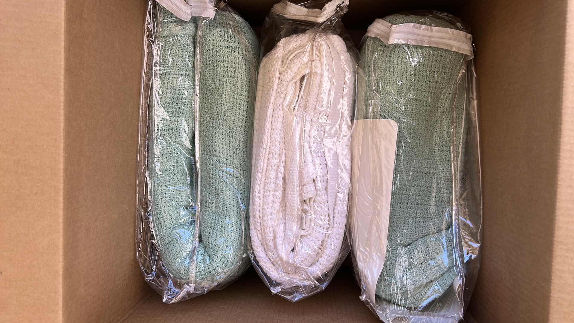 Photo 1 of BOX OF BLANKETS