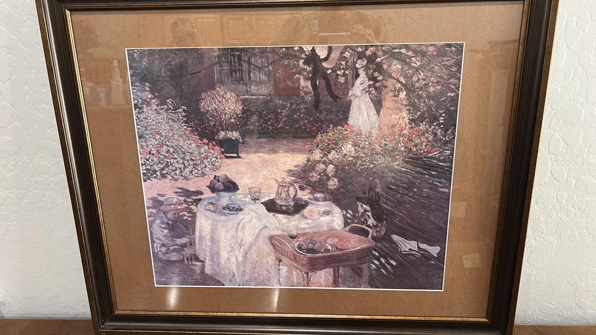 Photo 1 of FRAMED ART PRINT OF CLAUDE MONET’S 1873 PAINTING “THE LUNCHEON” (ALSO KNOWN AS “LE DÉJEUNER” 31” x H25 1/4”