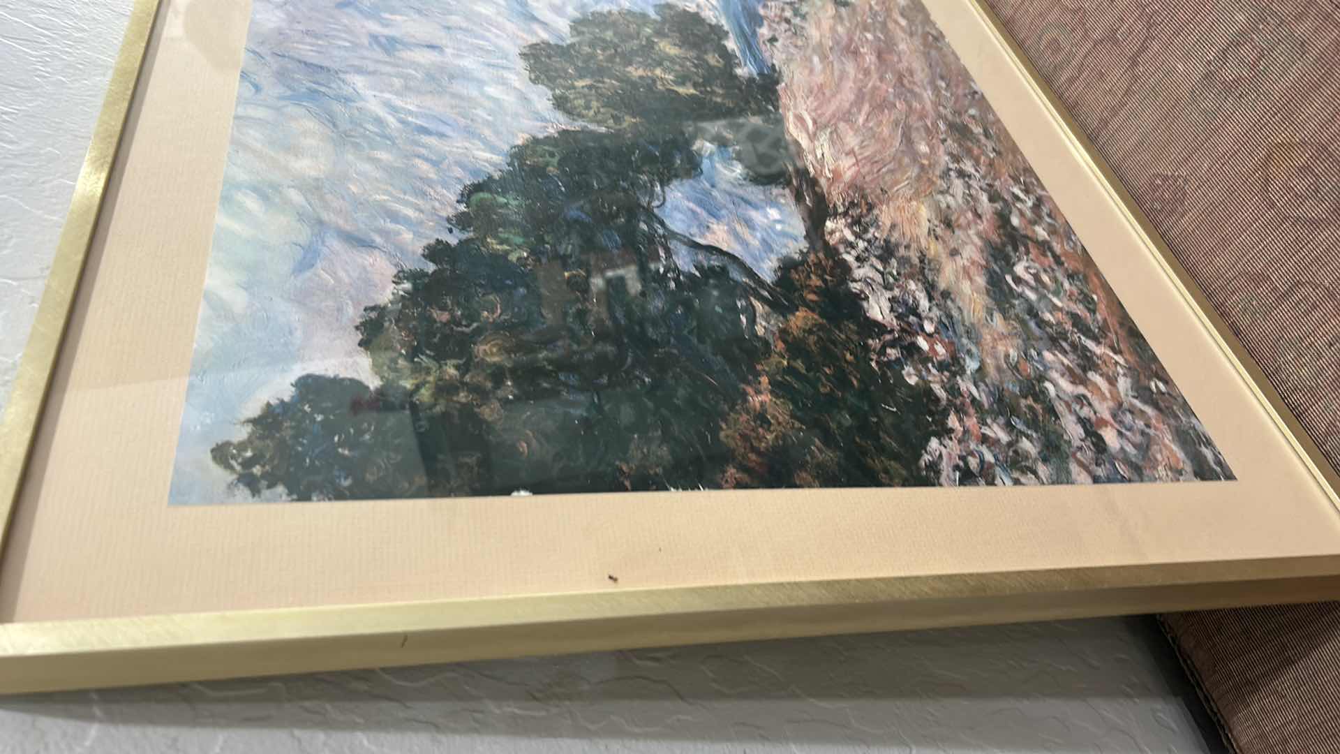 Photo 1 of FRAMED REPRODUCTION ART PRINT OF CLAUDE MONET’S “CAP MARTIN, NEAR MENTON, 1884”. ARTWORK. 28 1/4” x H22 1/2”
