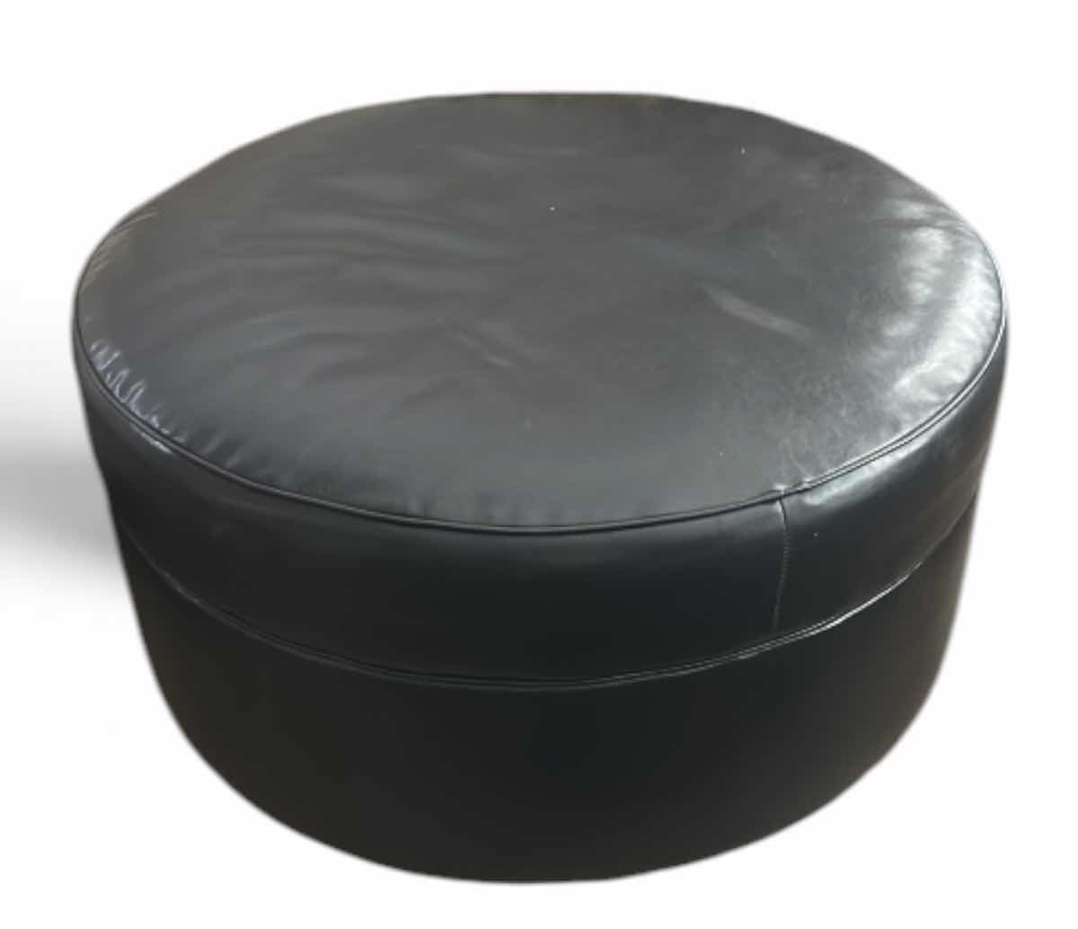 Photo 1 of ASHLEY FURNITURE ROUND IMITATION LEATHER OTTOMAN 38” x H19”