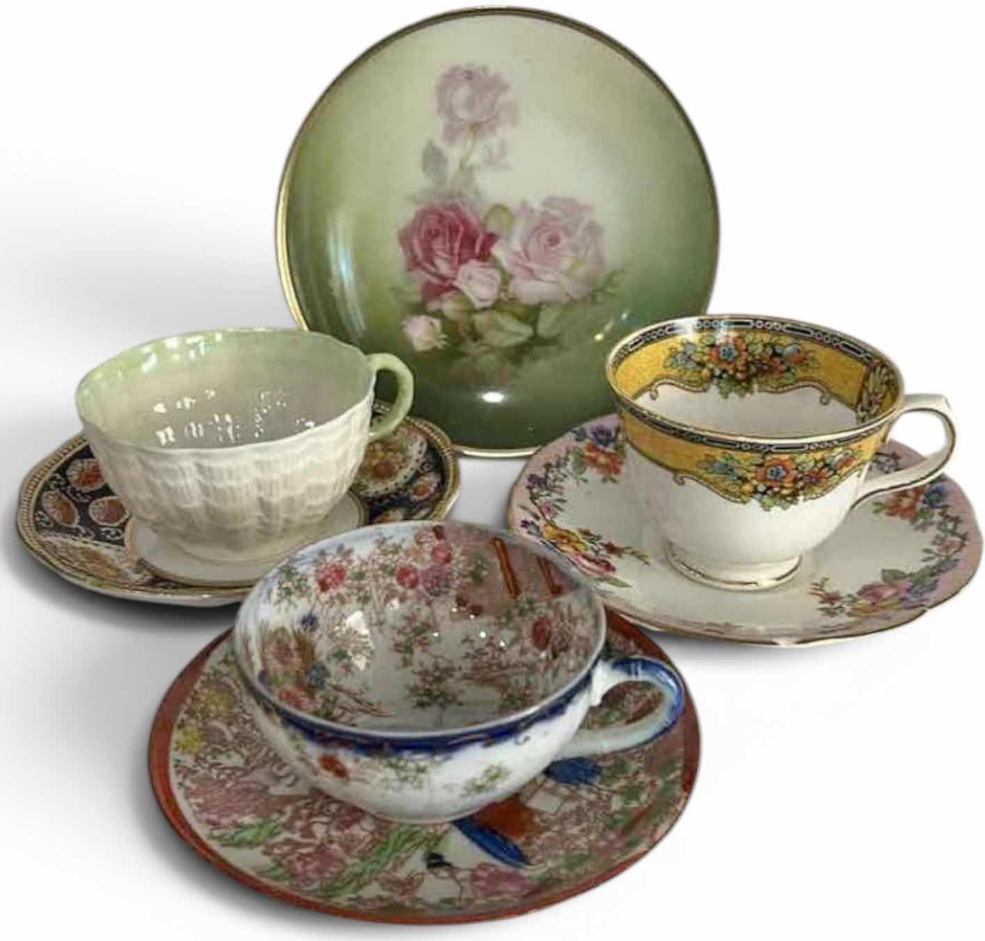 Photo 1 of MISMATCHED TEA, CUPS, AND SAUCERS