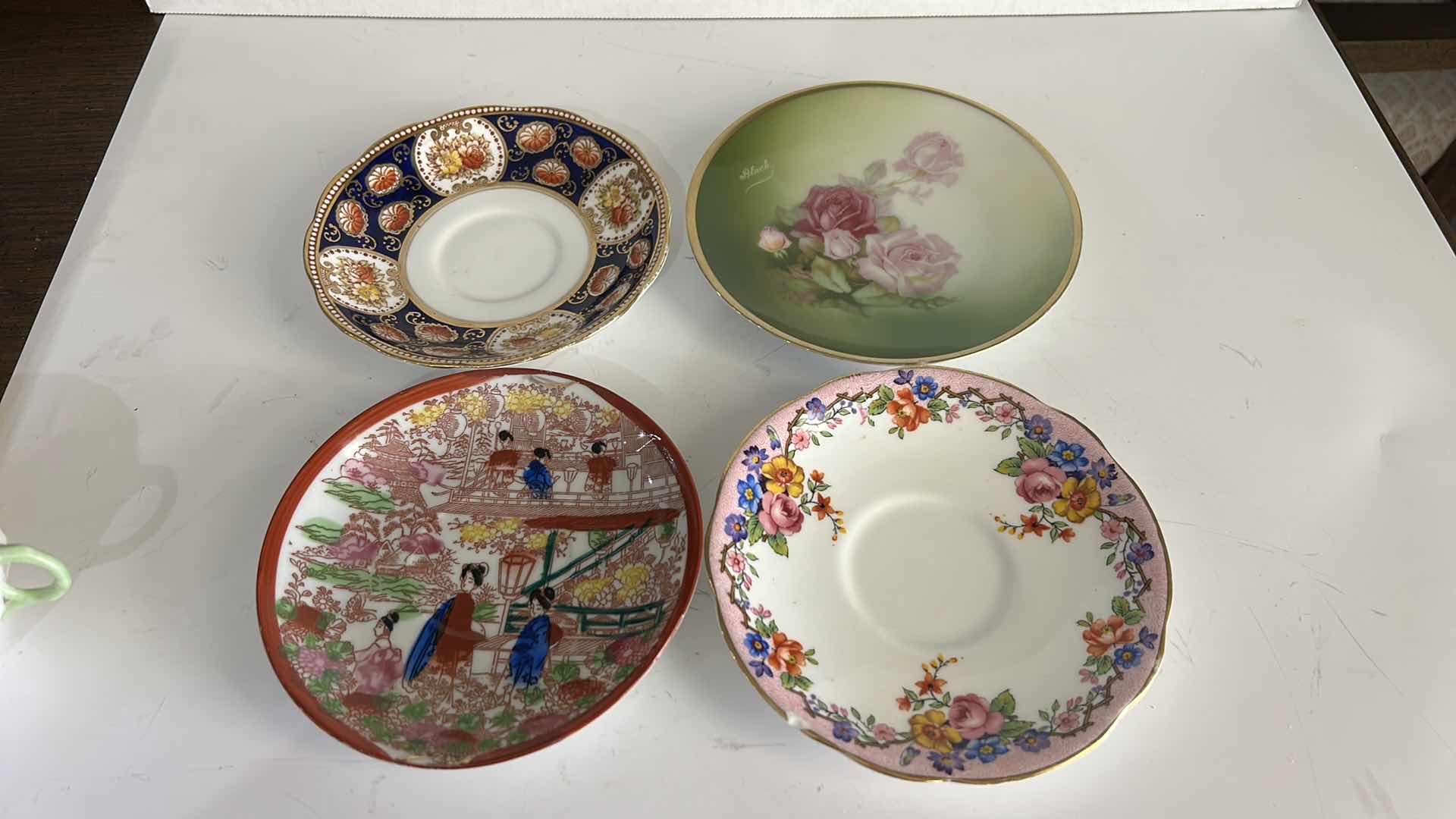 Photo 1 of MISMATCHED TEA, CUPS, AND SAUCERS