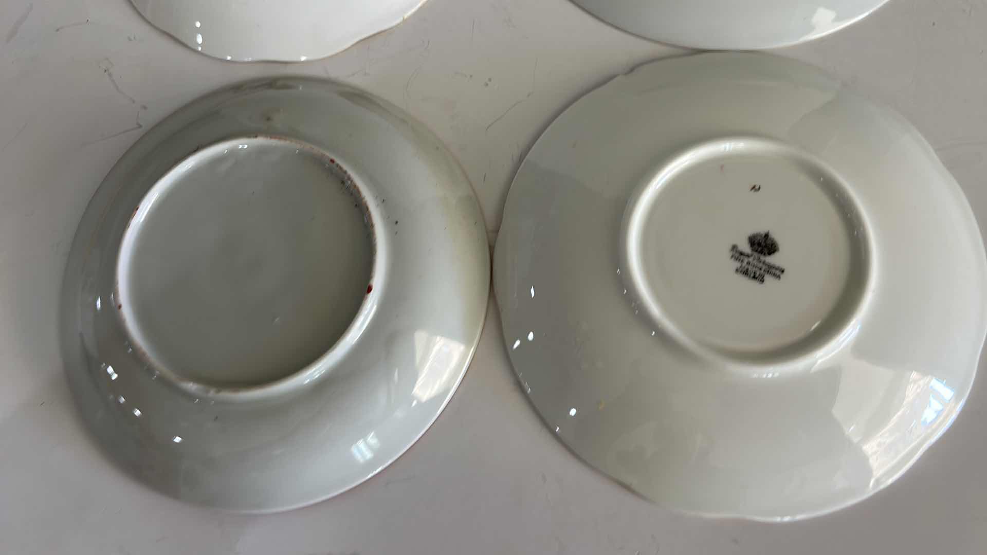 Photo 1 of MISMATCHED TEA, CUPS, AND SAUCERS