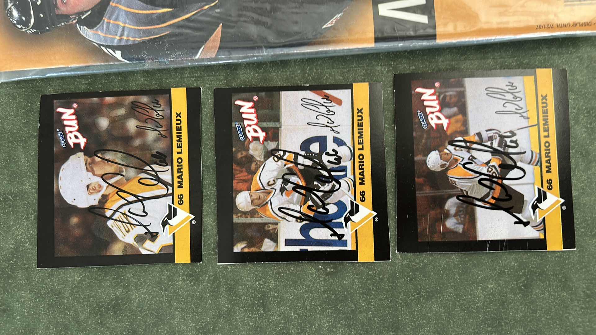 Photo 1 of COLLECTION OF MARIO LEMIEUX MEMORABILIA, SPECIFICALLY FEATURING A 1997 SPORTS ILLUSTRATED SPECIAL COMMEMORATIVE ISSUE AND ACCOMPANYING TRADING CARDS