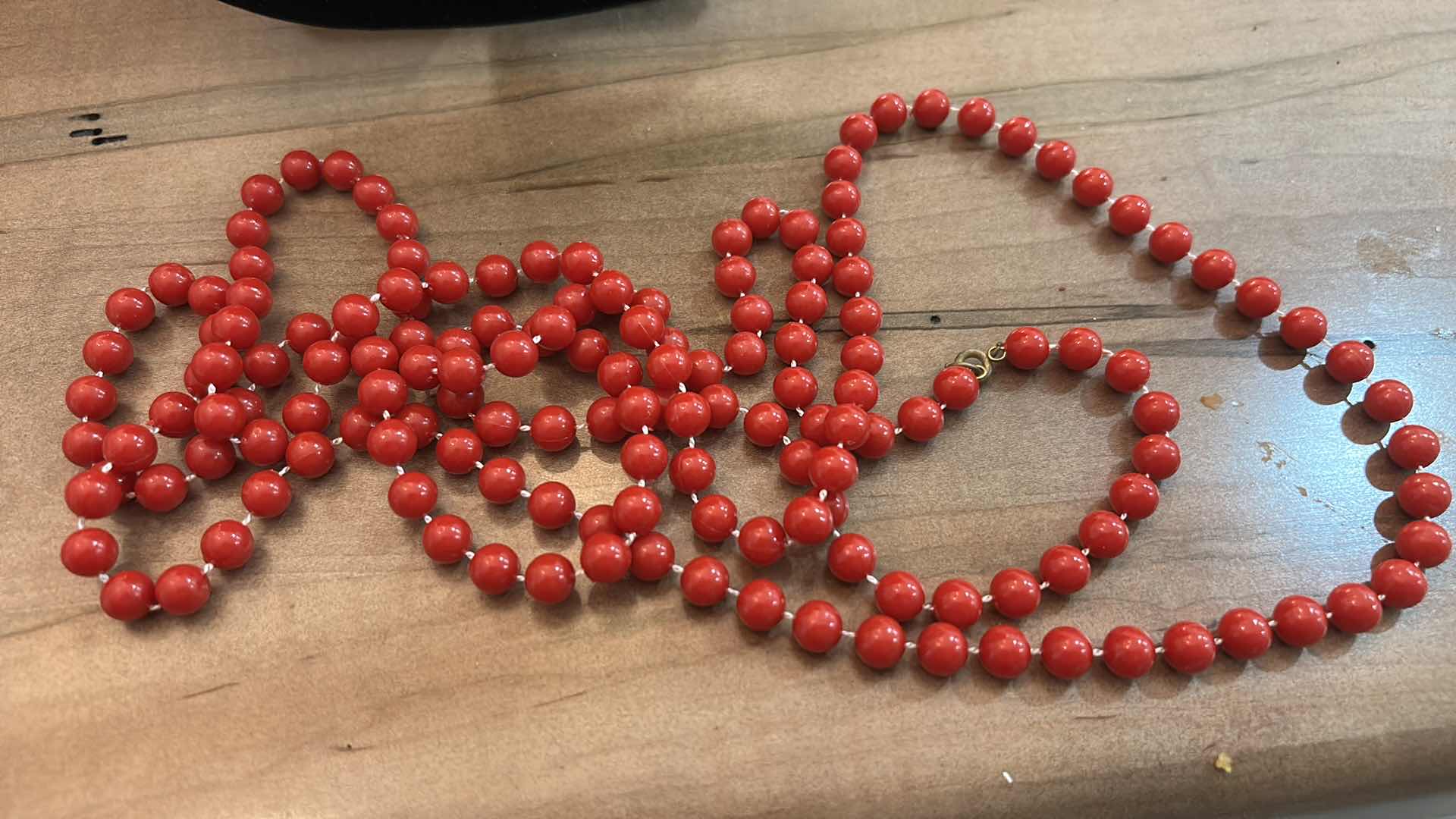 Photo 1 of THREE VINTAGE RED BEADED NECKLACES