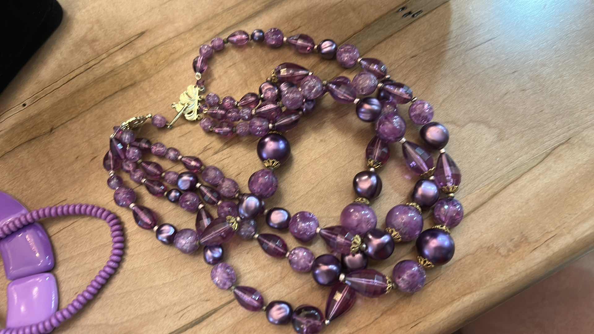 Photo 1 of THREE VINTAGE PURPLE NECKLACES