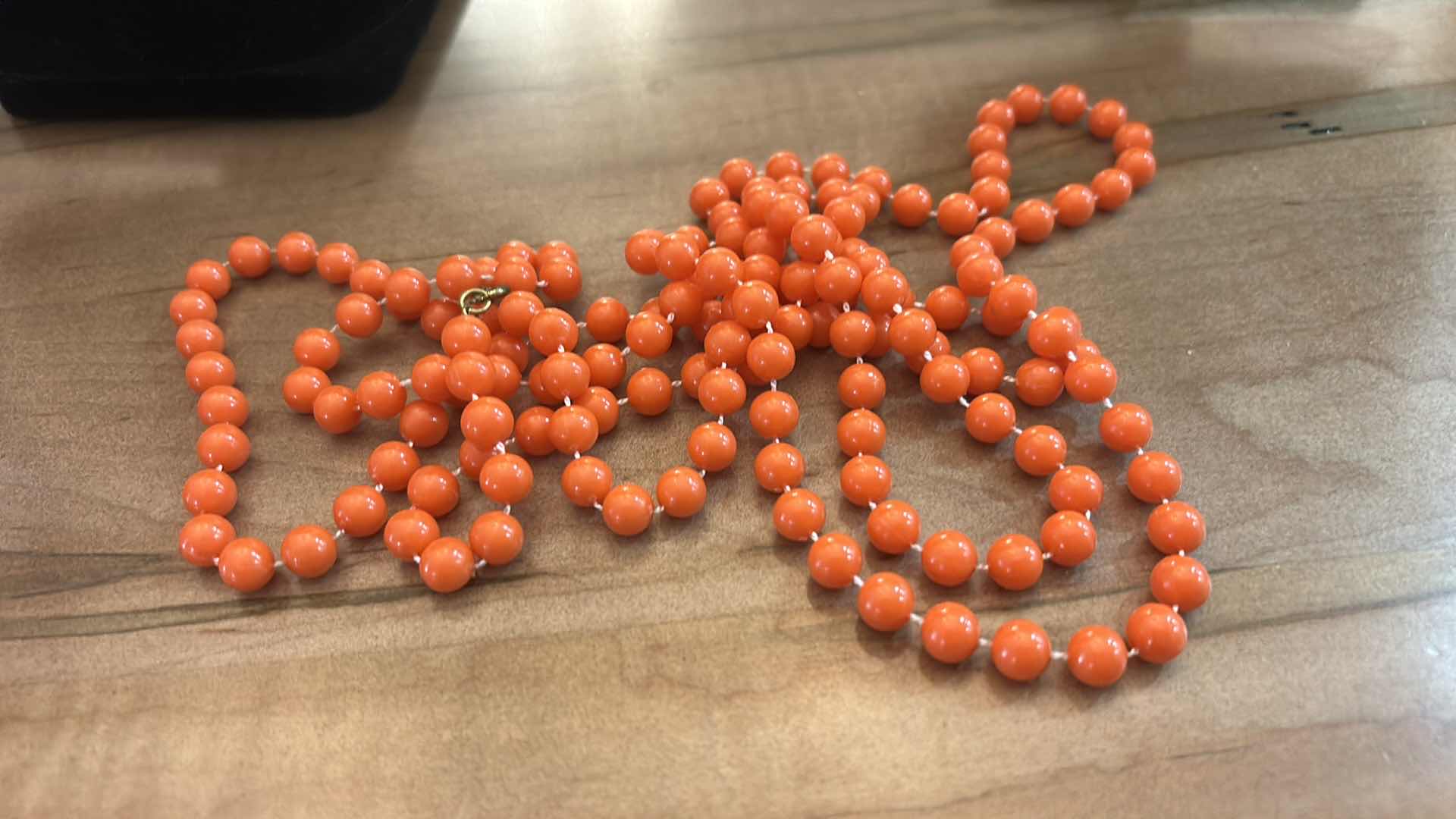 Photo 1 of THREE VINTAGE ORANGE TONE NECKLACES