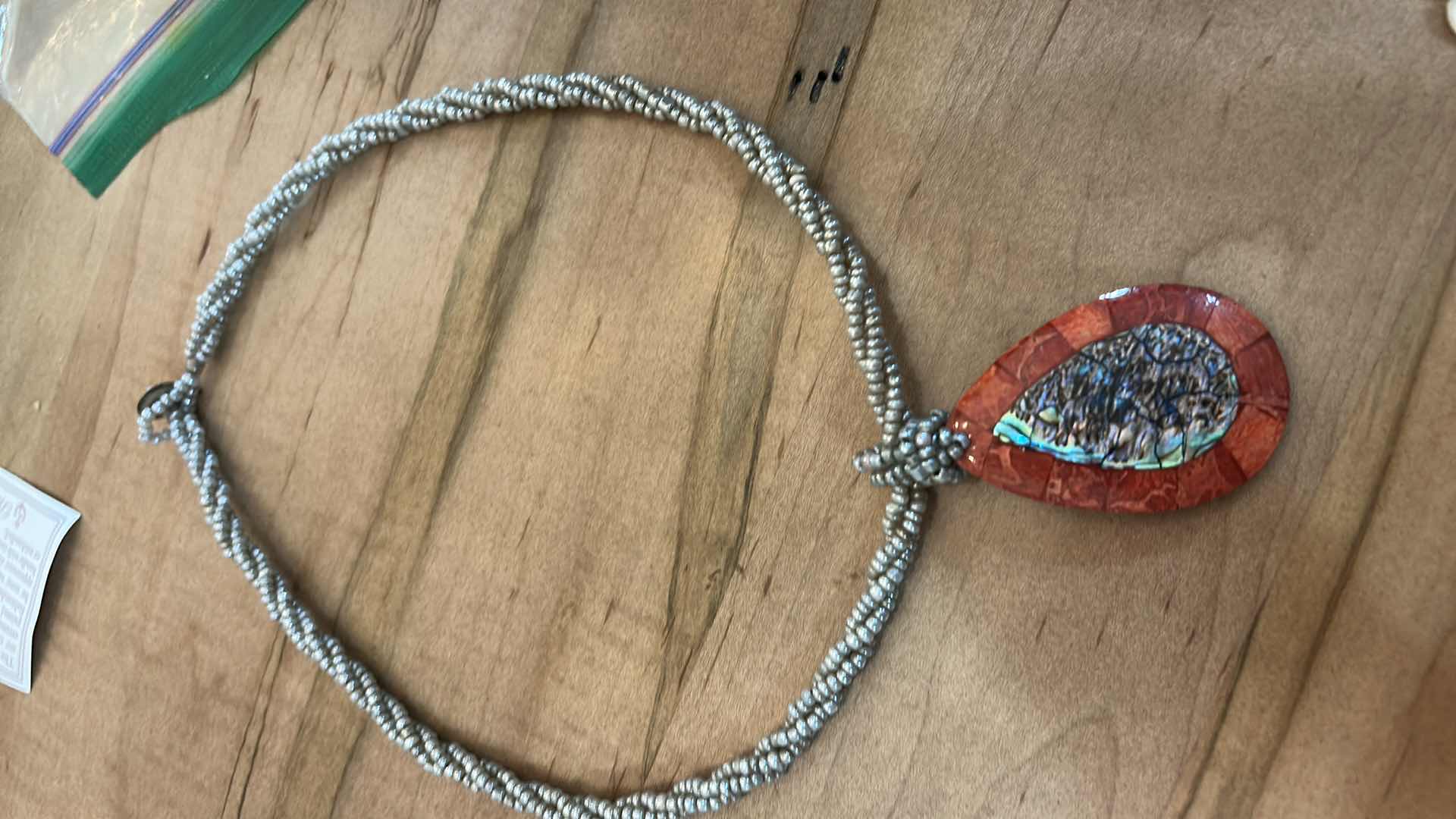 Photo 1 of THREE NECKLACES AND THREE BRACELETS