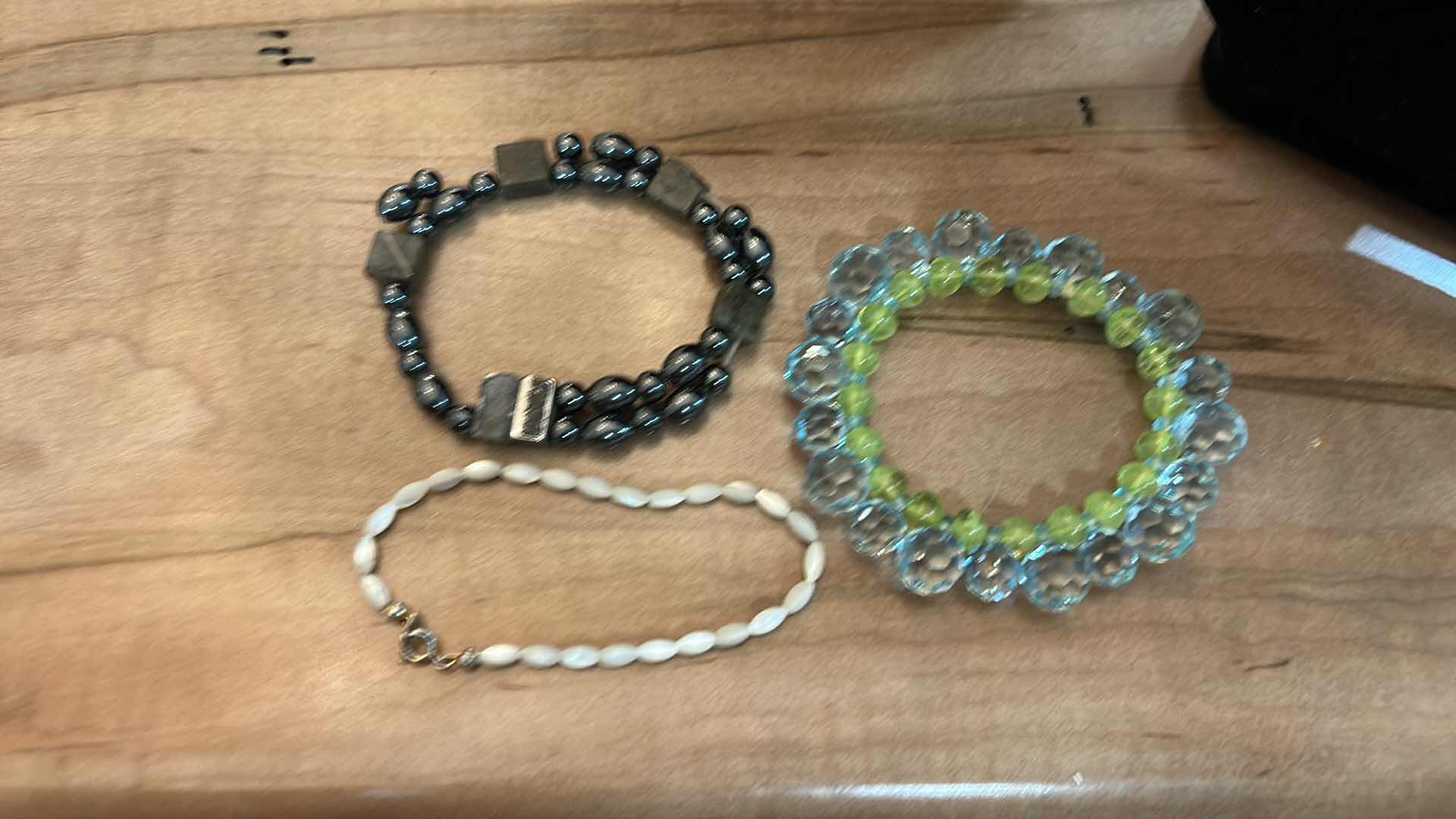 Photo 1 of THREE NECKLACES AND THREE BRACELETS