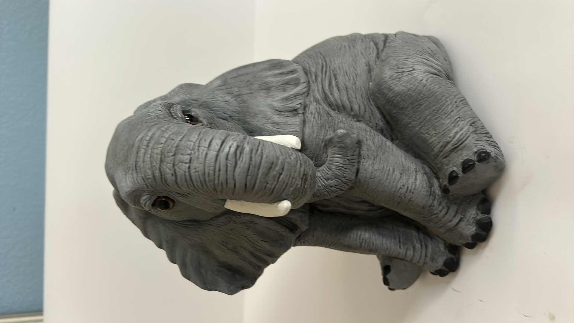 Photo 1 of GRAY SITTING BABY ELEPHANT STATUE  H10”