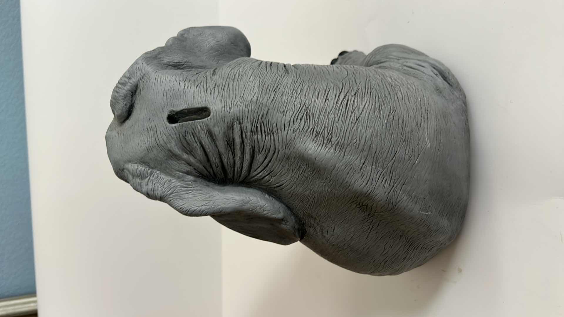 Photo 1 of GRAY SITTING BABY ELEPHANT STATUE  H10”