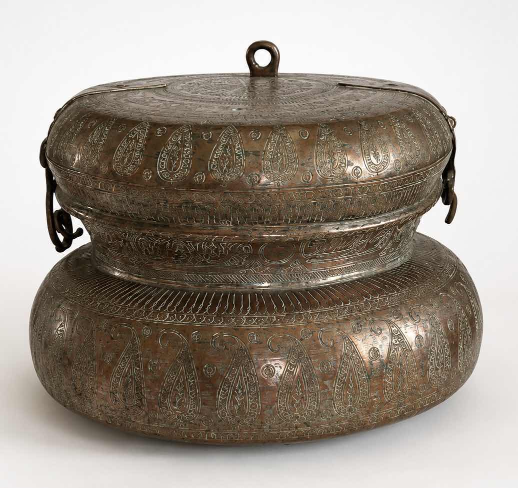 Photo 1 of ANTIQUE INDO-PERSIAN LIDDED JAR MADE OF TINNED COPPER  FEATURING INTRICATE ENGRAVED FLORAL AND GEOMETRIC PATTERNS. 13” x H9” $2000