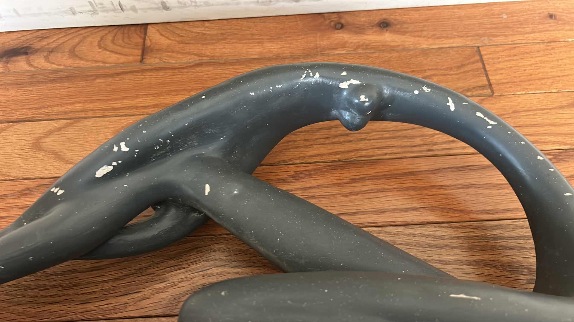 Photo 1 of VINTAGE 1970’S “STRETCHING DANCER”, ABSTRACT SCULPTURE BY AUSTIN PRODUCTIONS INC. DESIGNED BY ARTIST CLARA SEVER CRAFTED FROM PLASTER WITH A MATTE BLACK FINISH, MOUNTED ON A WOOD BASE . 23” x 5 1/2“ x H8“