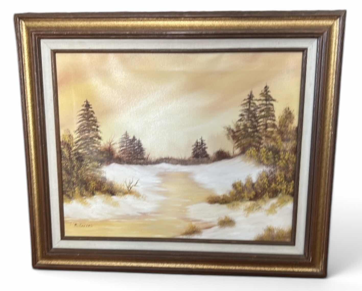 Photo 1 of VINTAGE FRAMED OIL ON CANVAS ARTWORK, WINTER LANDSCAPE SIGNED BY THE ARTIST RENOS. 25 1/2” x H21 1/2”