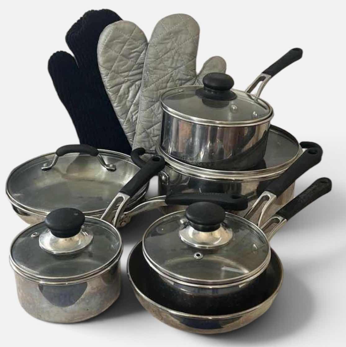Photo 1 of FARBERWARE POTS AND PANS WITH LIDS AND OVEN MITTS