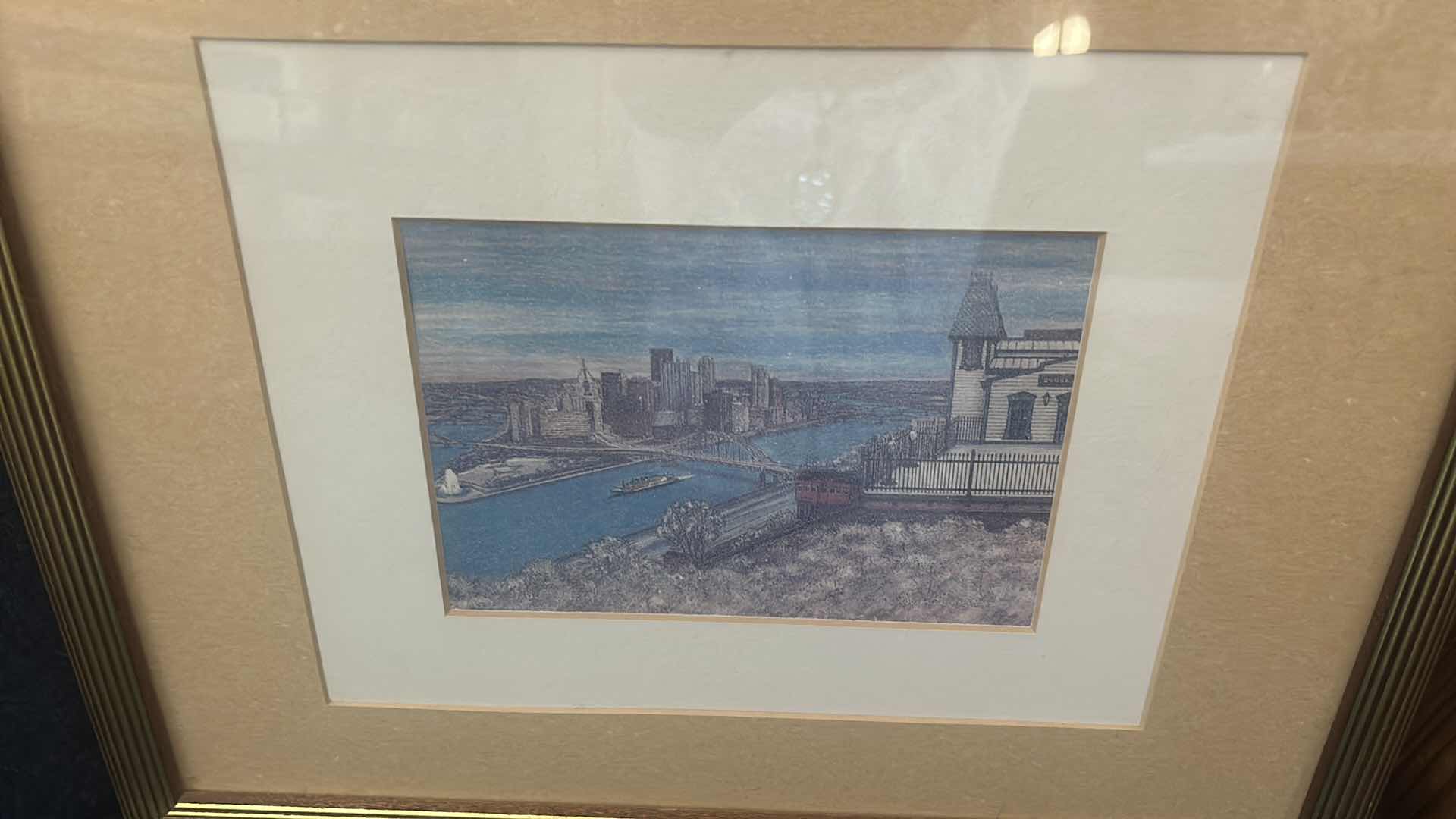 Photo 1 of FRAMED PRINT ARTWORK BY REGIONAL ARTIST, NEVIN ROBINSON TITLED “PITTSBURGH
 FROM MOUNT WASHINGTON” 15 1/2 x H12 1/2