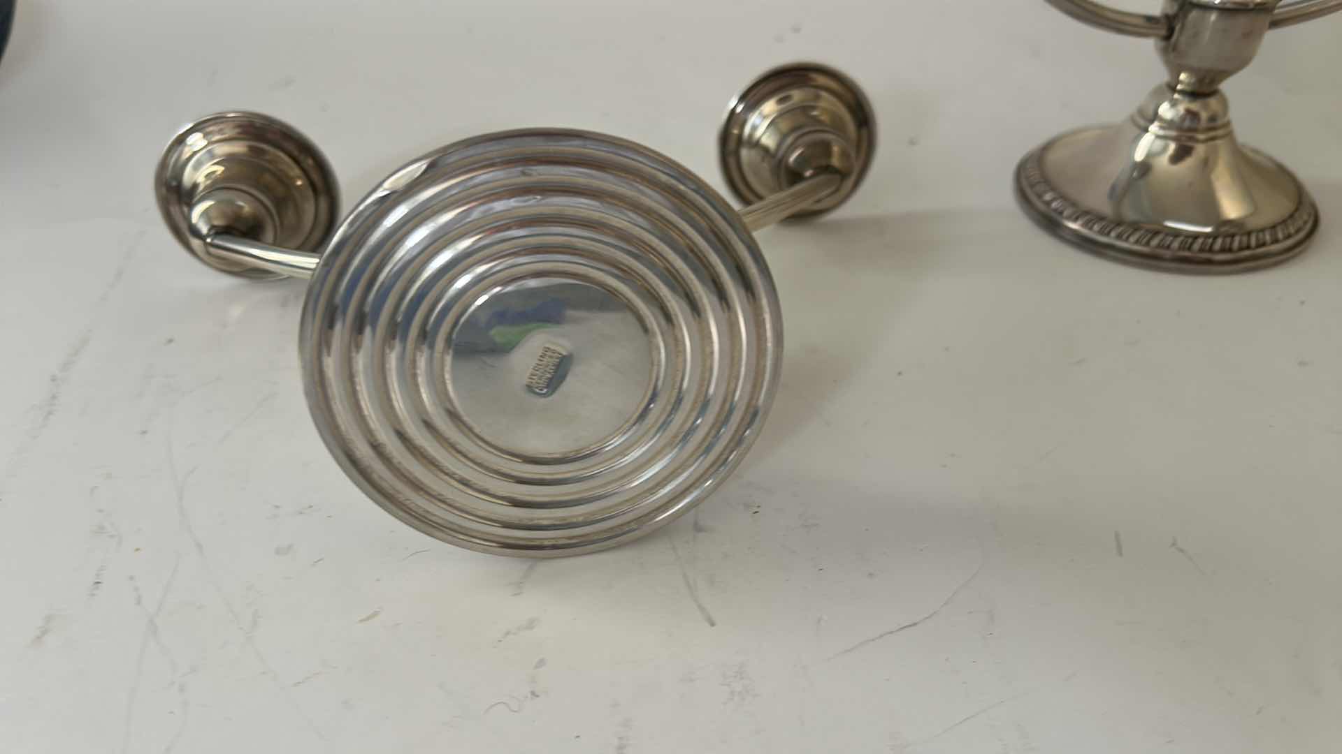 Photo 1 of PAIR OF STAMPED STERLING SILVER CANDELABRAS ( BOTTOMS REINFORCED WITH CEMENT FOR STABILITY)H5”