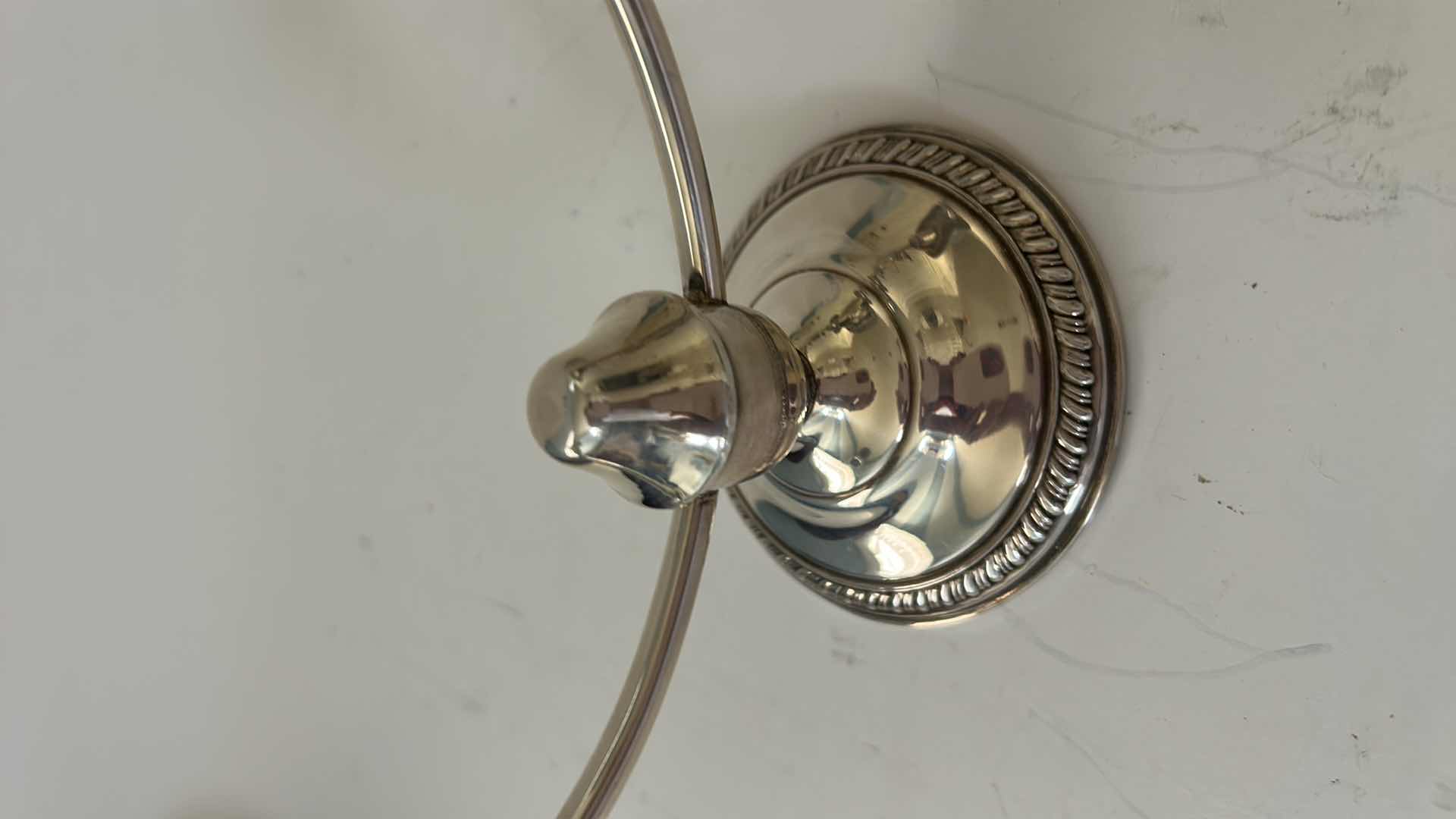 Photo 1 of PAIR OF STAMPED STERLING SILVER CANDELABRAS ( BOTTOMS REINFORCED WITH CEMENT FOR STABILITY)H5”
