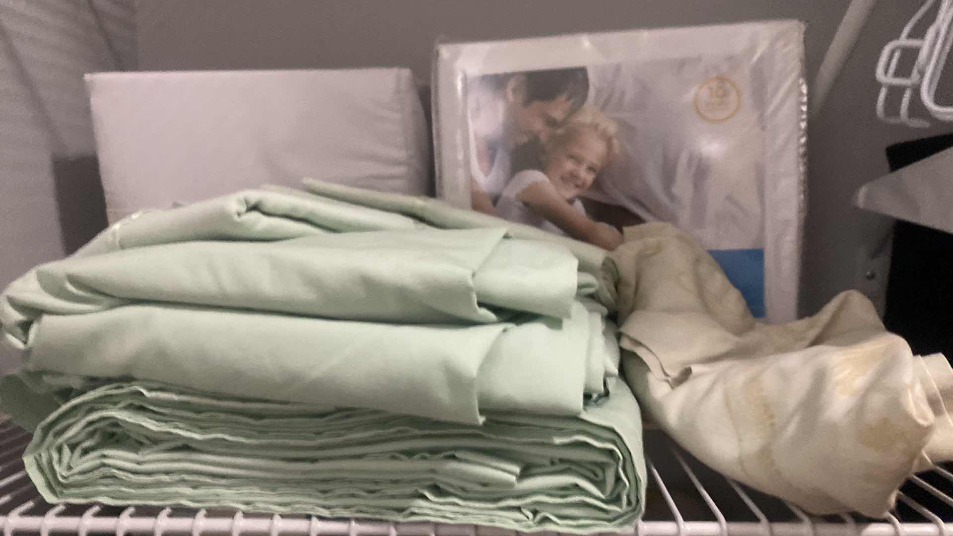 Photo 1 of SHEETS LINENS AND HEATING PADS