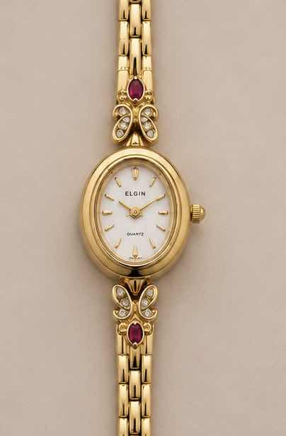 Photo 1 of VINTAGE ELGIN PETITE DRESS WATCH MODEL EG8077 MOTHER-OF-PEARL OVAL DIAL GENUINE RUBY AND CRYSTAL DIAMOND CHIP ACCENT, GOLD TONE LINKED BRACELET BAND