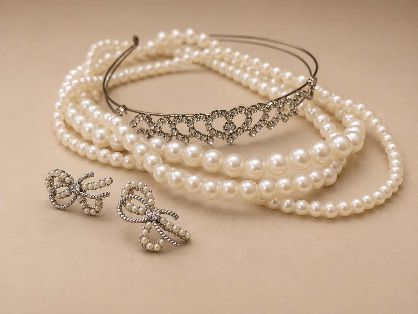 Photo 1 of THREE STRANDS OF IMITATION PEARLS, VINTAGE TIARA, AND VINTAGE EARRINGS