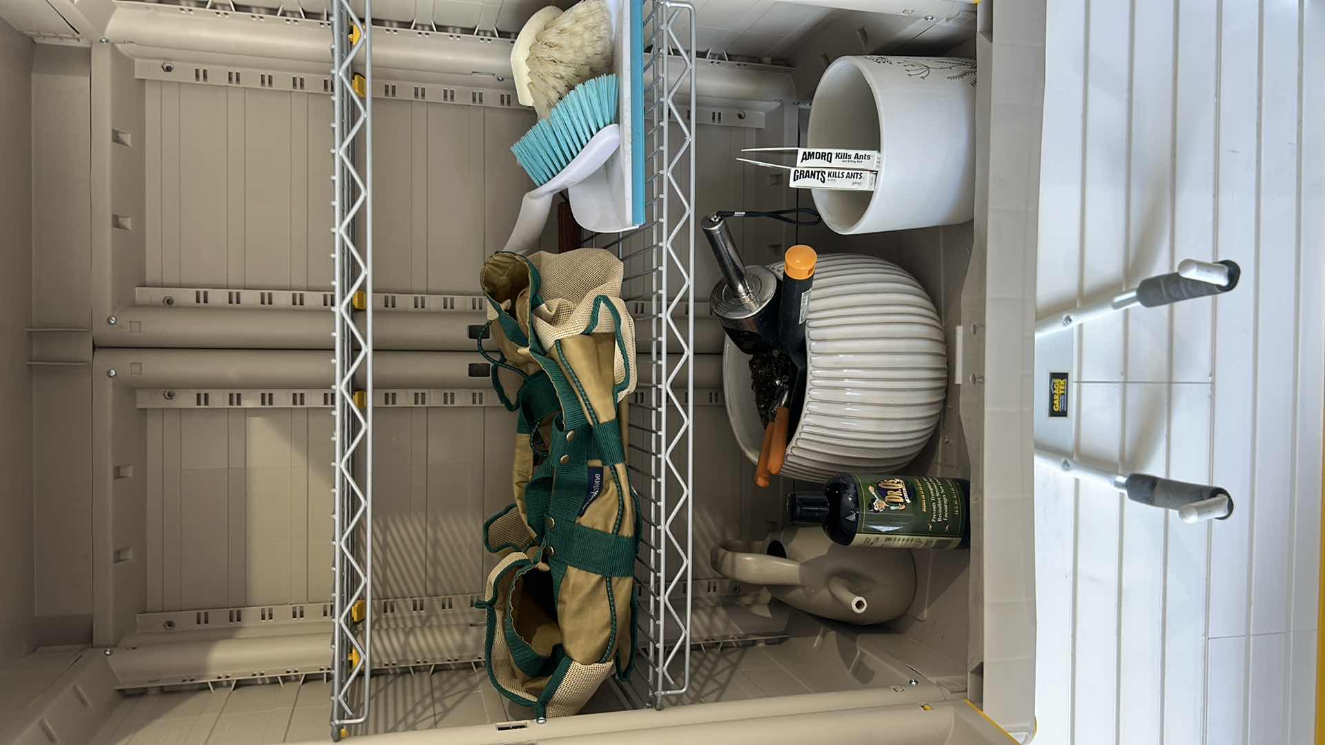 Photo 1 of CONTENTS OF GARAGE CABINET  GARDENING RAKE