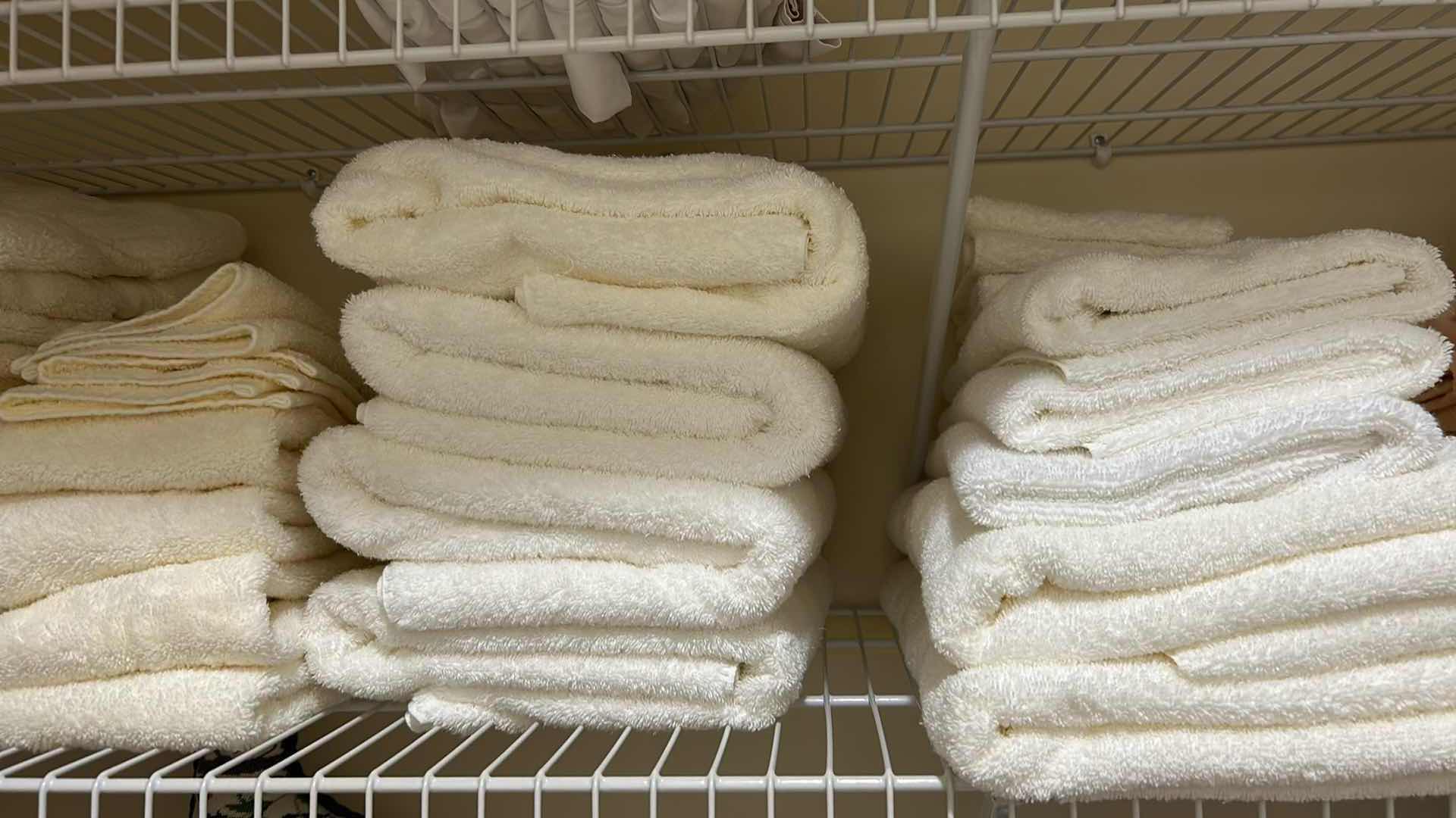 Photo 1 of CONTENTS OF SHELF ASSORTMENT OF  WHITE TOWELS