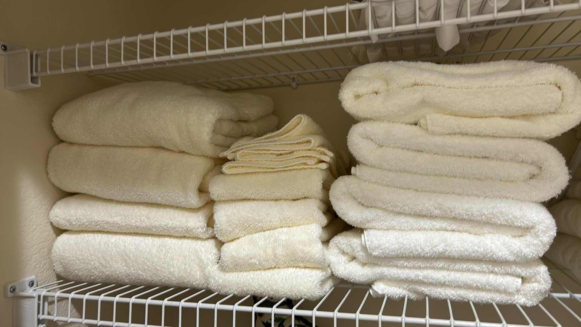 Photo 1 of CONTENTS OF SHELF ASSORTMENT OF  WHITE TOWELS