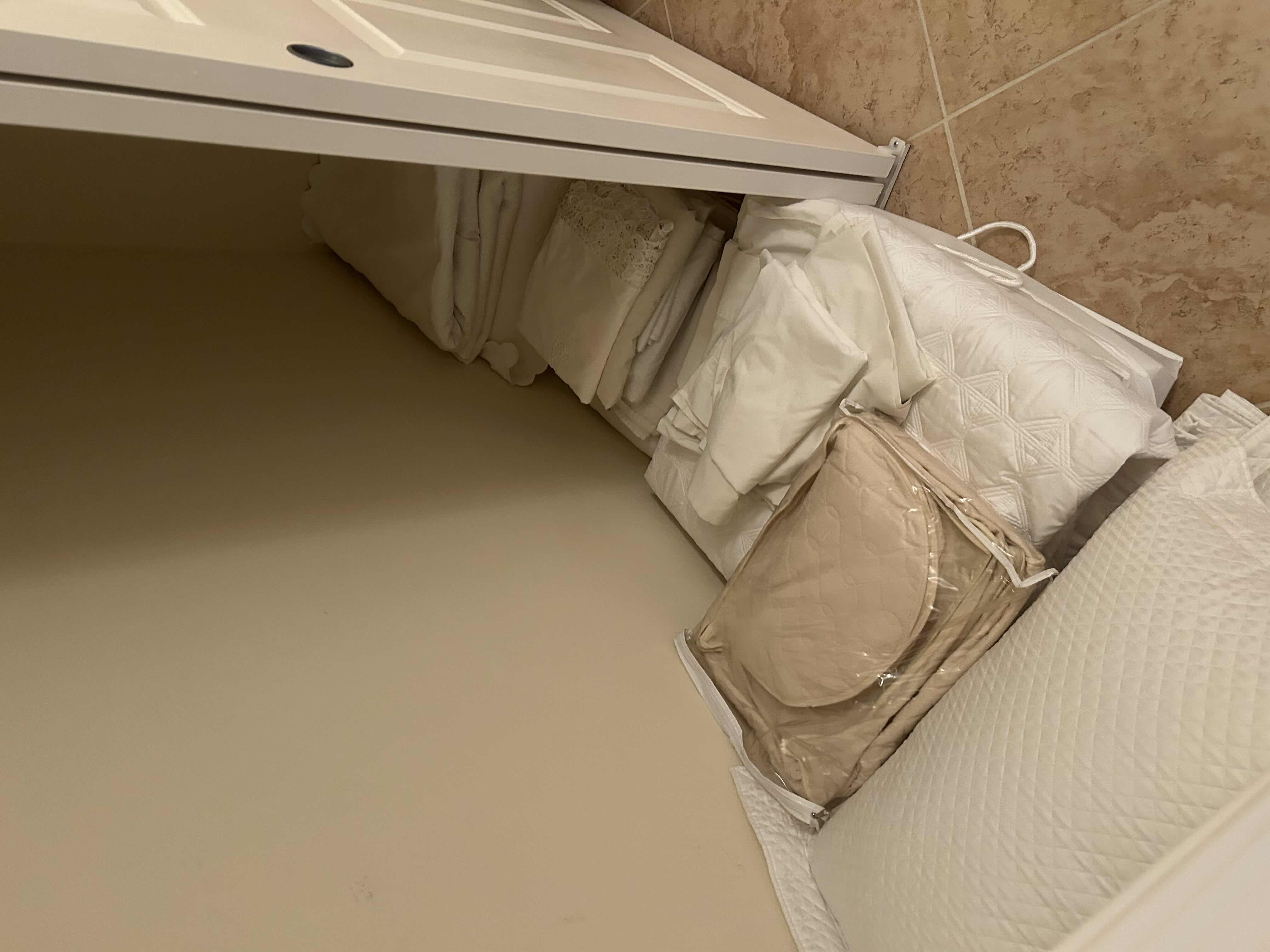 Photo 1 of CONTENTS OF CLOSET WHITE BEDDING