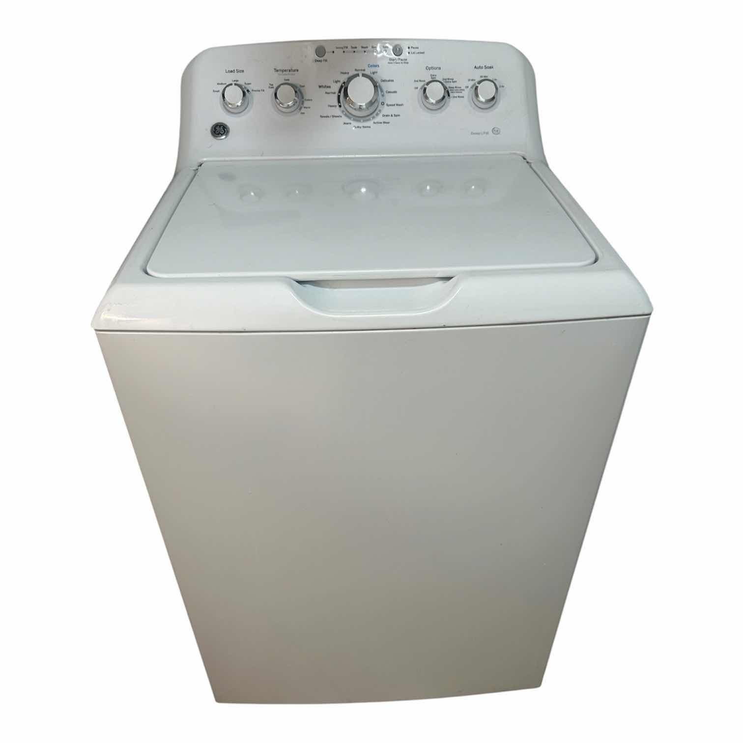 Photo 1 of WHITE GE TOP LOAD WASHER W 4.5 CUBIC FOOT CAPACITY AND STAINLESS STEEL BASKET 27" X 27" H 44"