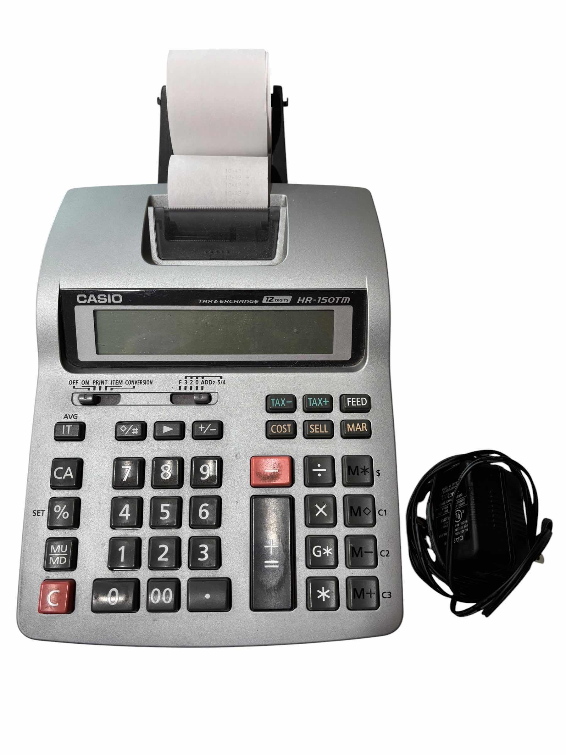 Photo 1 of CASIO PRINTING CALCULATOR WITH PAPER ROLLS $65