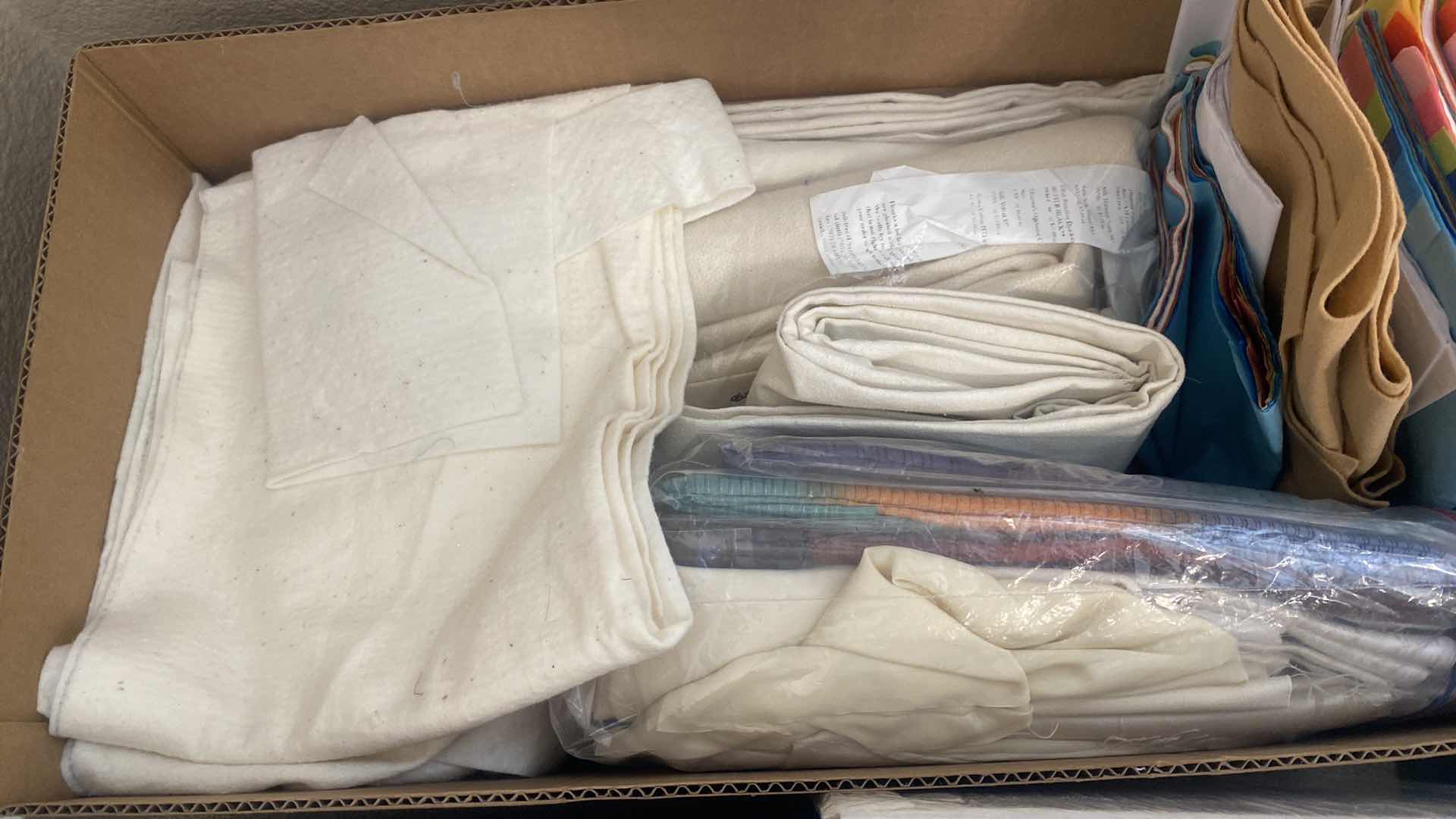 Photo 1 of FOUR BOXES OF FABRIC AND CRAFTING SUPPLIES