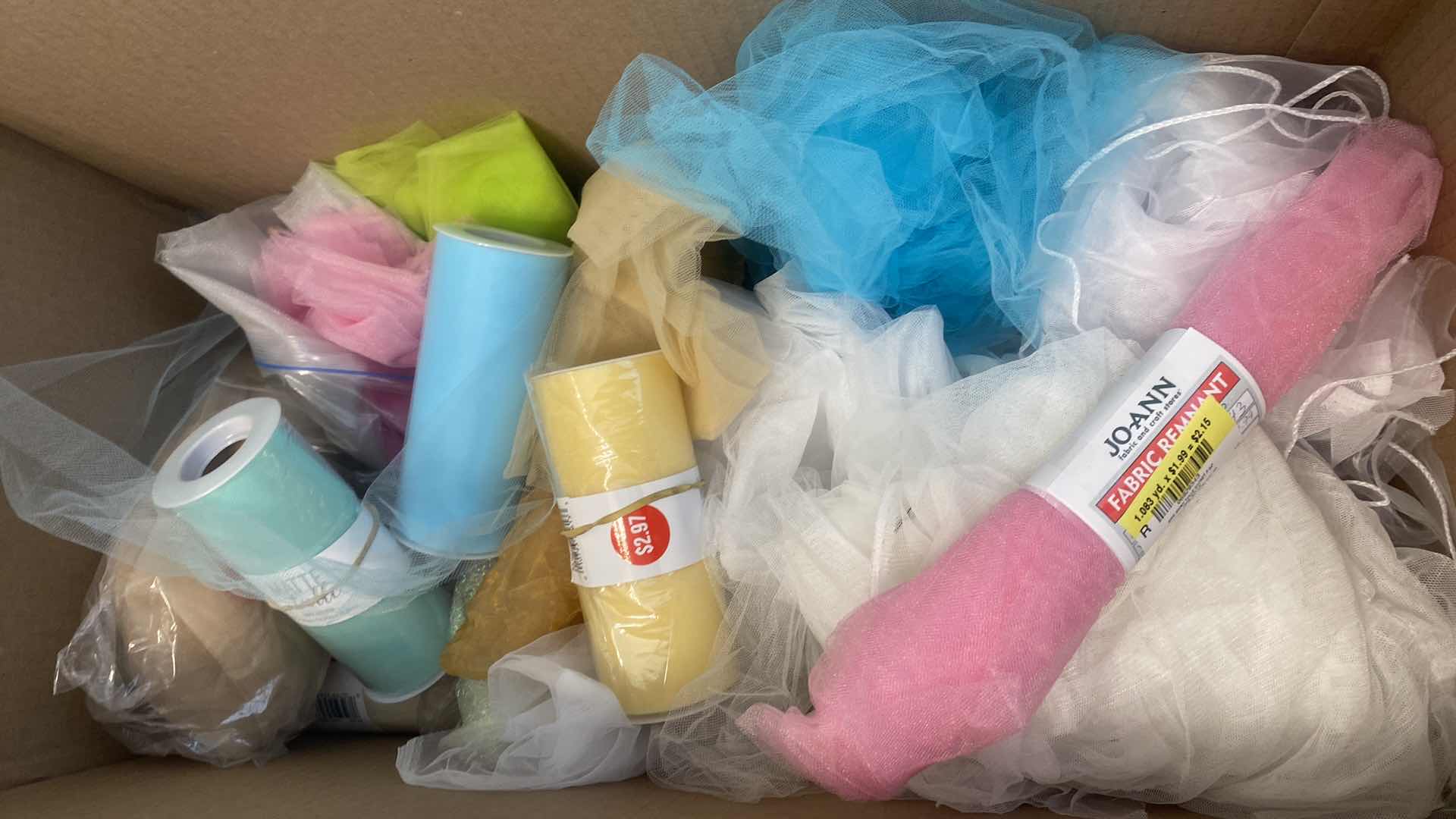 Photo 1 of FOUR BOXES OF FABRIC CHUNKY YARN AND CRAFTING SUPPLIES