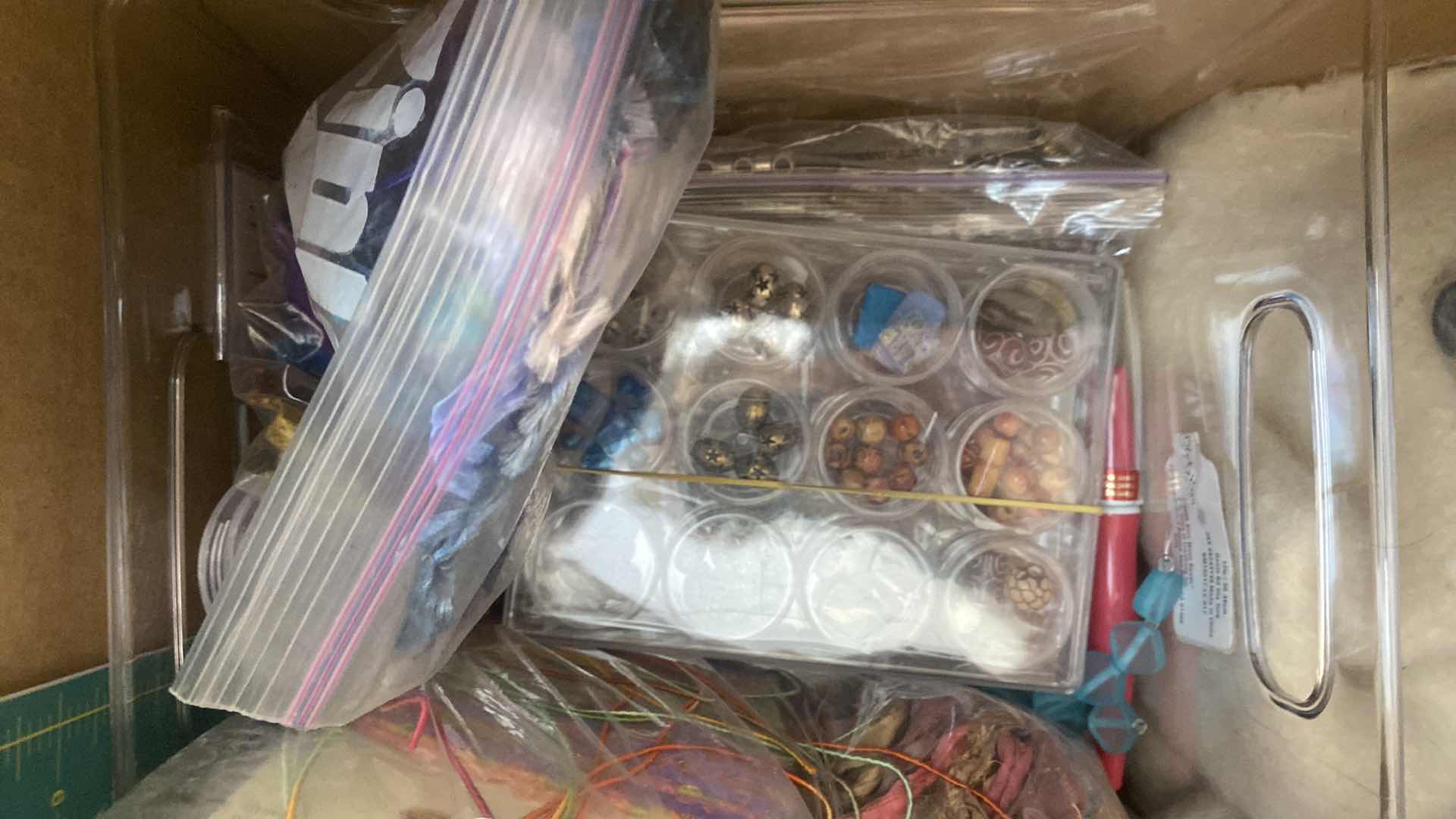 Photo 1 of FOUR BOXES OF FABRIC CHUNKY YARN AND CRAFTING SUPPLIES