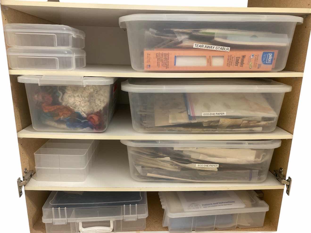 Photo 1 of FOUR SHELVES IN CABINET FABRIC AND CRAFTING SUPPLIES