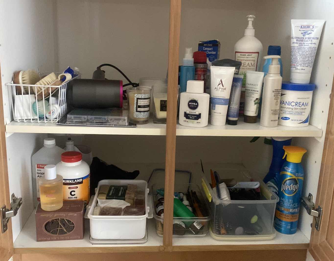 Photo 1 of CONTENTS OF CABINET PERSONAL CARE & CANDLES