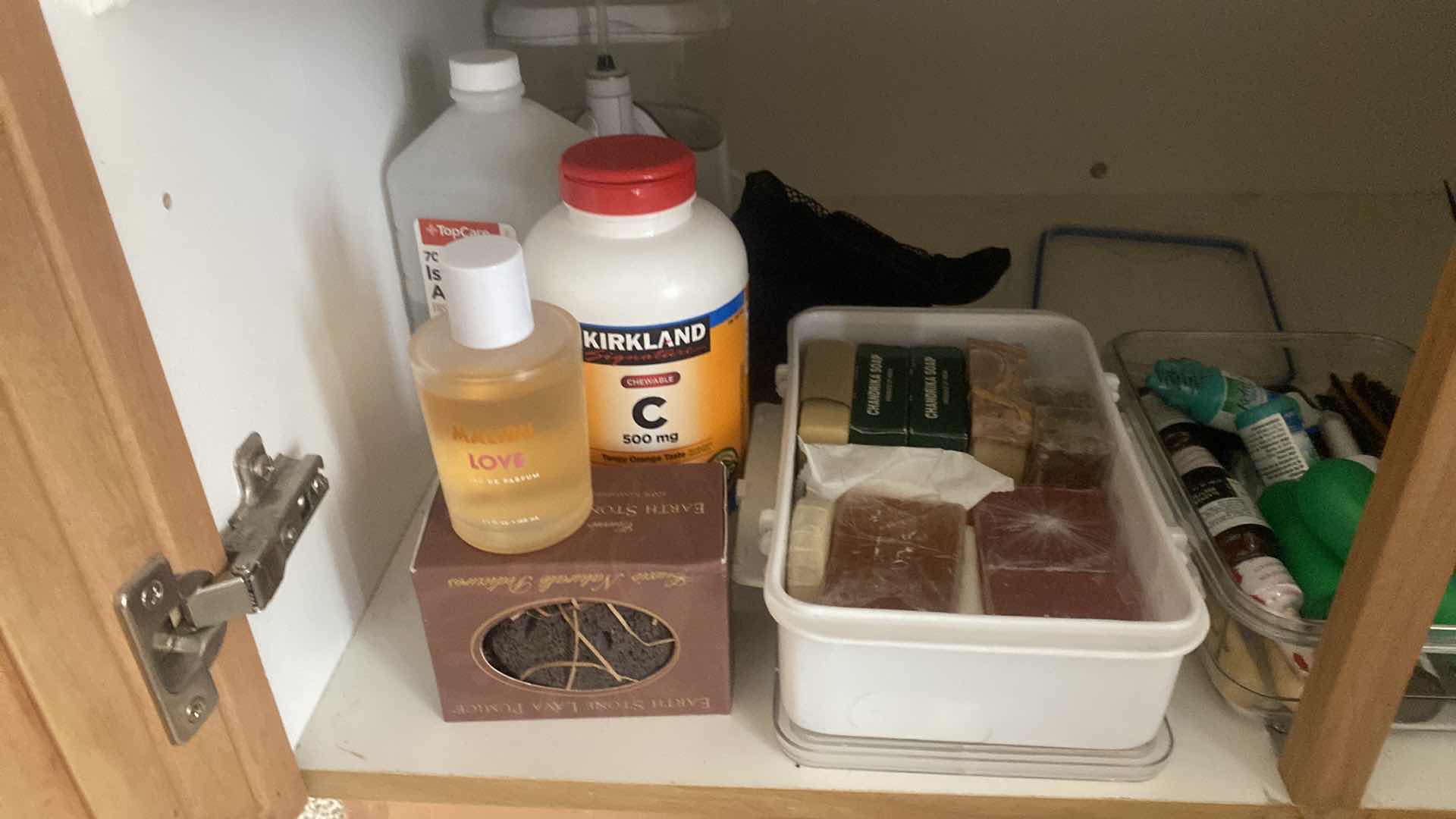 Photo 1 of CONTENTS OF CABINET PERSONAL CARE & CANDLES
