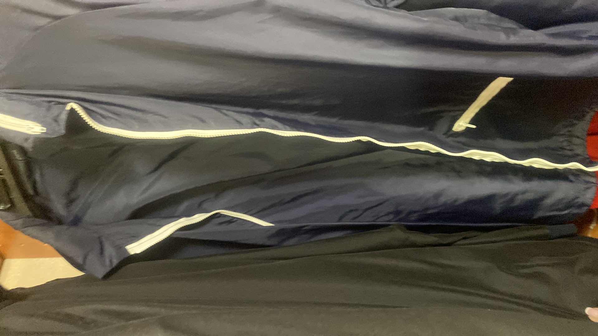 Photo 1 of MEN’S CLOTHING, PANTS AND LIGHTWEIGHT JACKETS SIZE  MEDIUM AND LARGE & 36 x 34