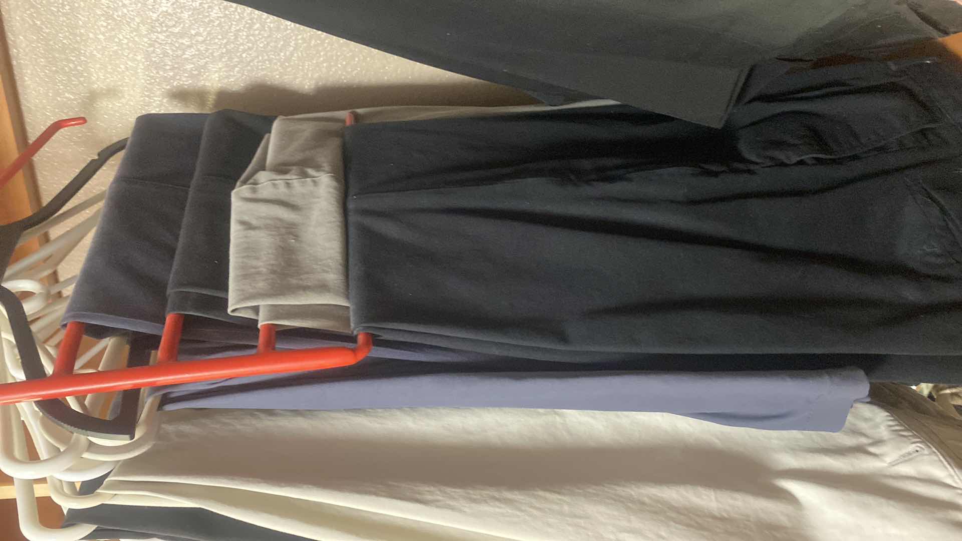 Photo 1 of MEN’S CLOTHING, PANTS AND LIGHTWEIGHT JACKETS SIZE  MEDIUM AND LARGE & 36 x 34