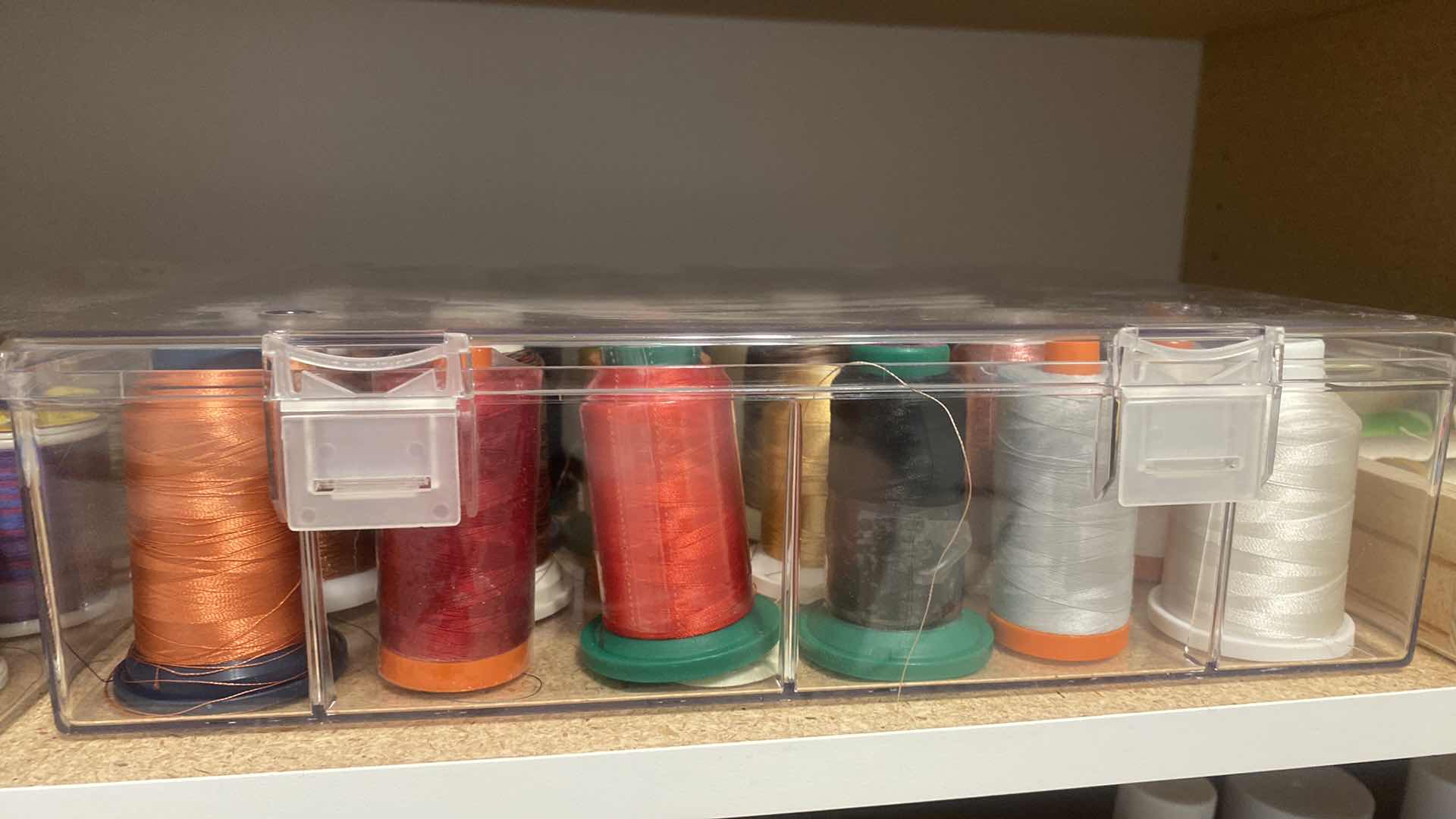 Photo 1 of CONTENTS OF CABINET TWO SHELVES WITH THREAD AND CRAFTING SUPPLIES