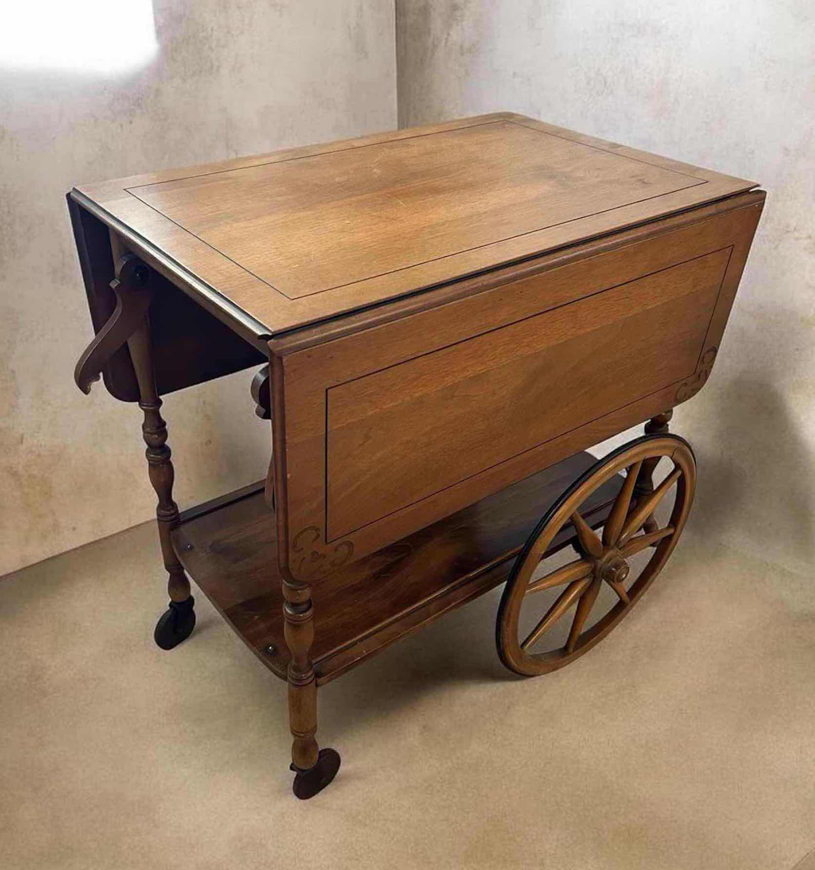 Photo 1 of VINTAGE COLONIAL STYLE DROP LEAF TEA CART W WOOD CONSTRUCTION  27" X 18" H 27"  OPEN 38" WIDE