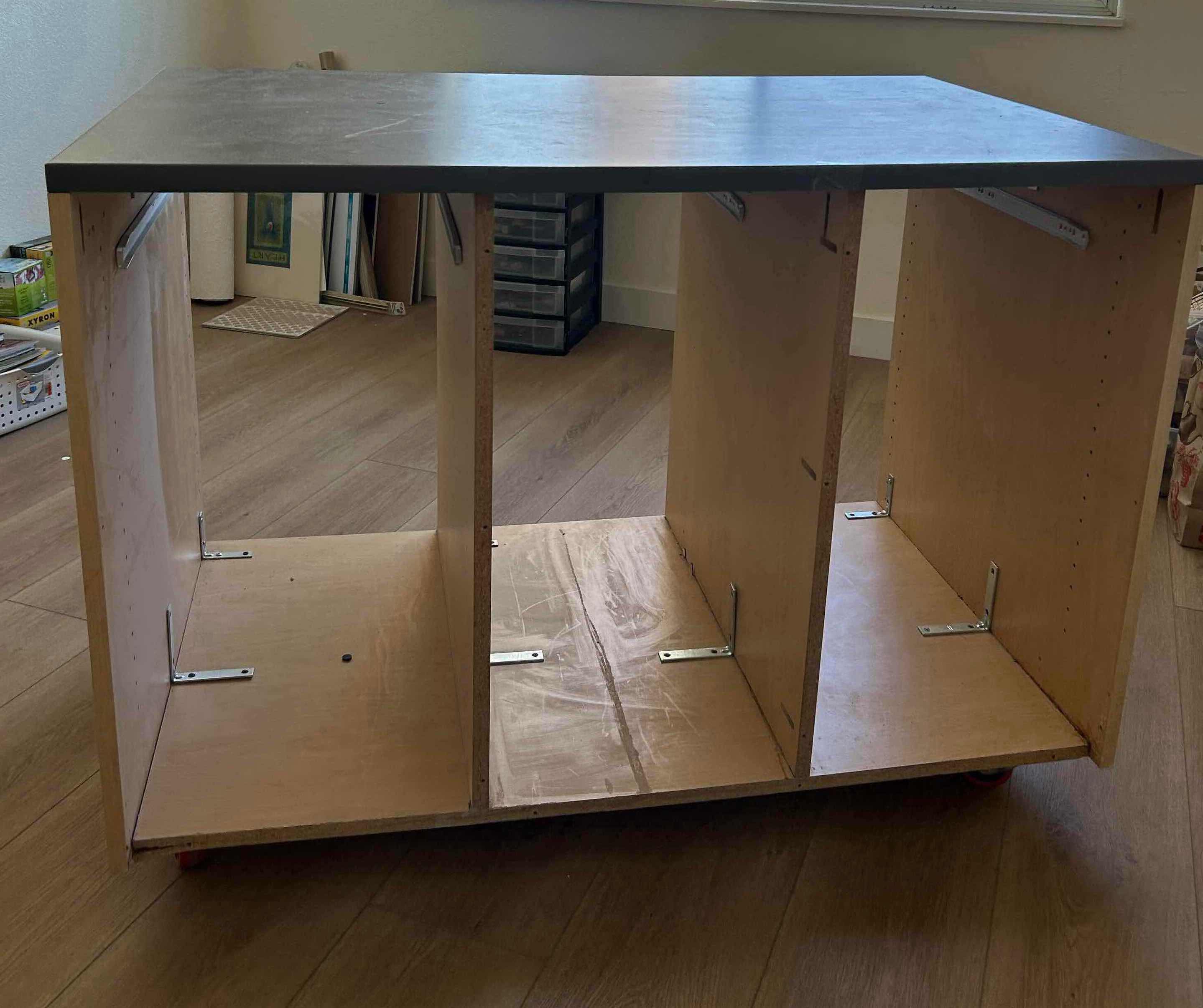 Photo 1 of DIY MOBILE CRAFT TABLE W DARK LAMINATE COUNTER TOP
$200