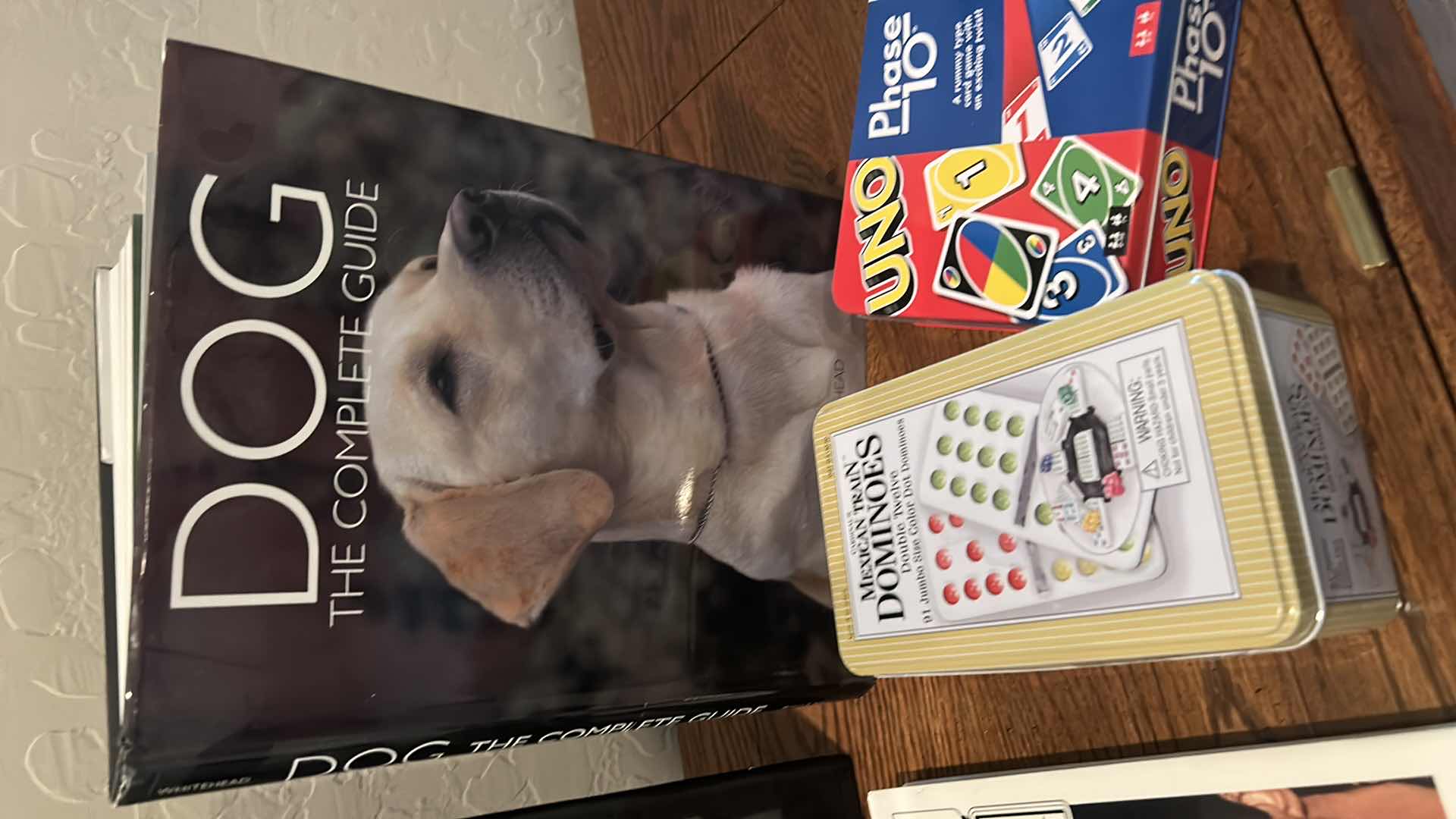 Photo 1 of COFFEE TABLE BOOKS, GAMES, & ORNATE CRUCIFIX