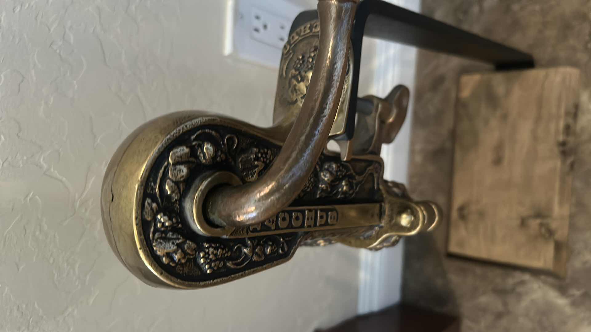 Photo 1 of VINTAGE BACCAUS TABLE TOP WINE BOTTLE OPENER MOUNTED ON ELEVATED WOOD H 23"