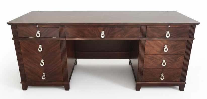 Photo 1 of WALNUT EXECUTIVE DESK WITH MATCHED VENEER, BRASS HARDWARE, KEYBOARD PULLOUT AND BUILT-IN ELECTRICAL PLUGS FOR COMPUTER EQUIPMENT 65” x 2‘ x H30“