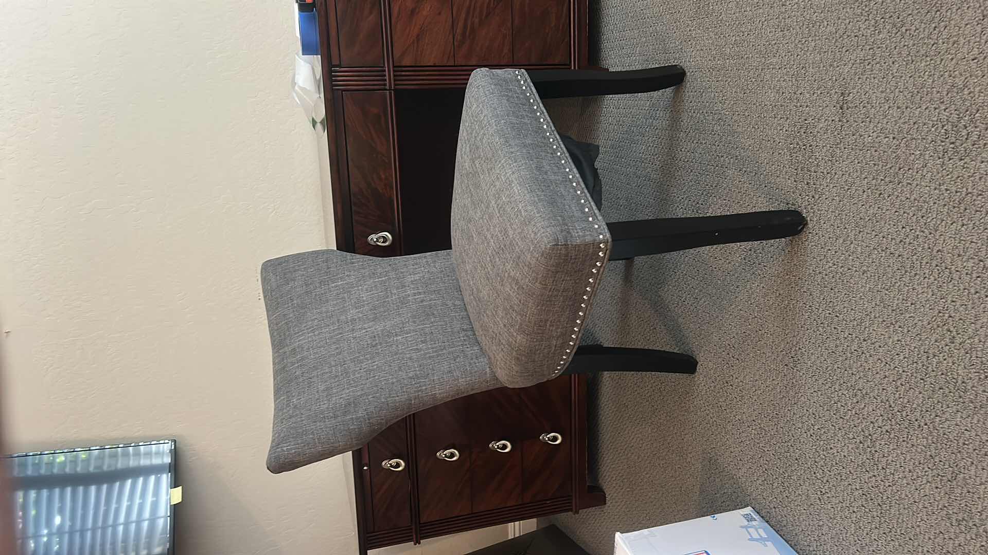 Photo 1 of GRAY UPHOLSTERED DINING CHAIR / DESK CHAIR WITH NAILHEAD TRIM AND BLACK LEGS 21 1/2” x 21” x H27 1/2”