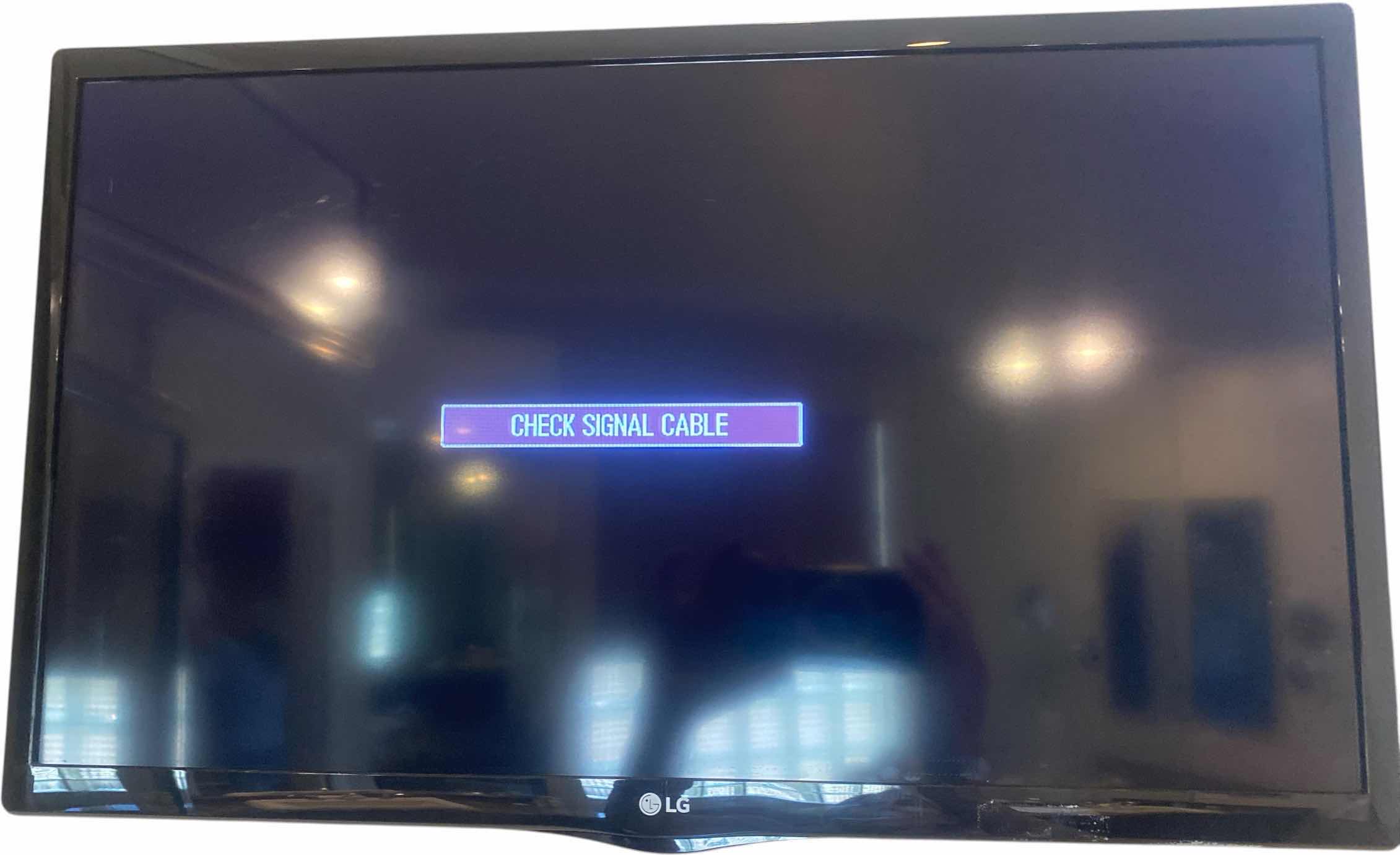 Photo 1 of 23” LG TV WITH REMOTE & WALL MOUNT