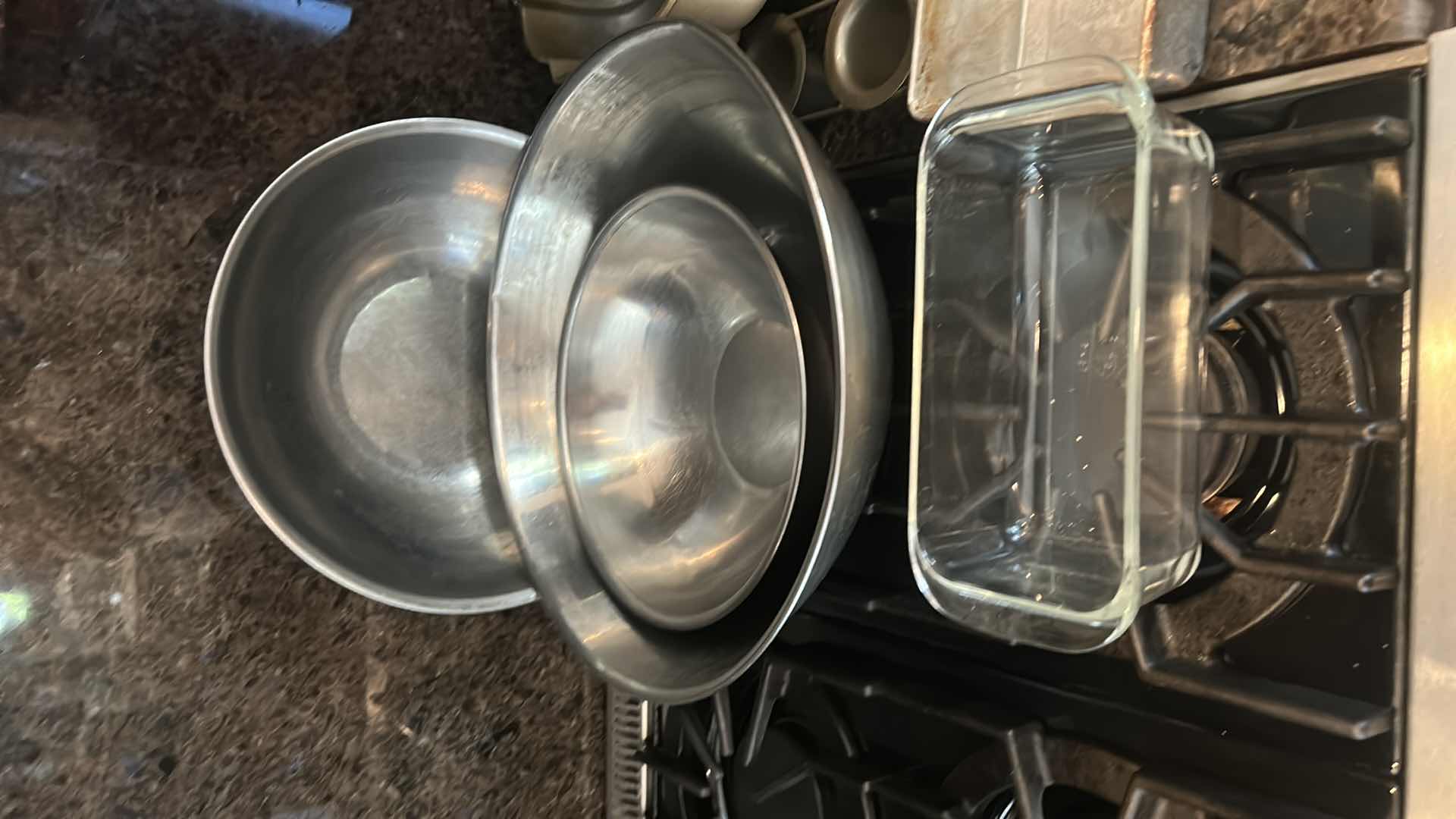 Photo 1 of BAKING SUPPLIES- LARGE MIXING BOWLS, MUFFIN TIN, COOLING RACK, ROLLING PIN & MORE