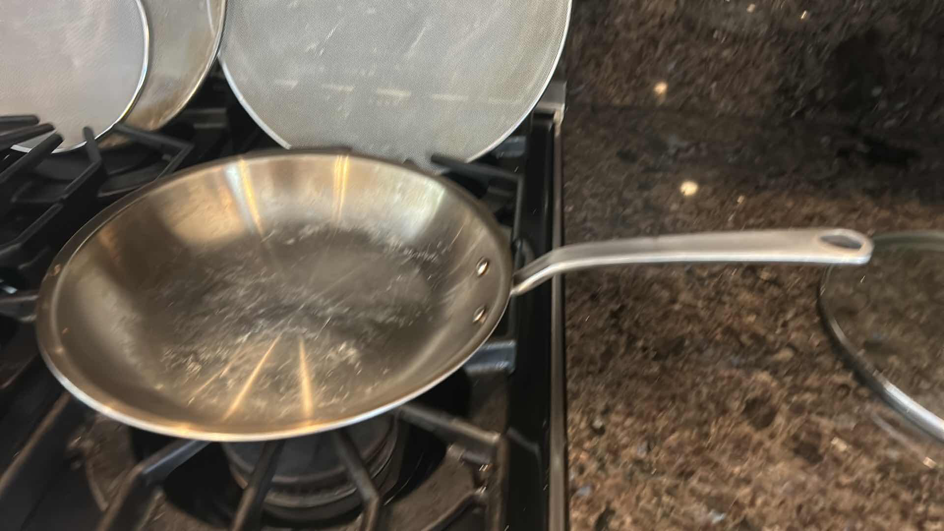 Photo 1 of 3 EMERIL SKILLETS AND 4 OIL SPATTER COVERS